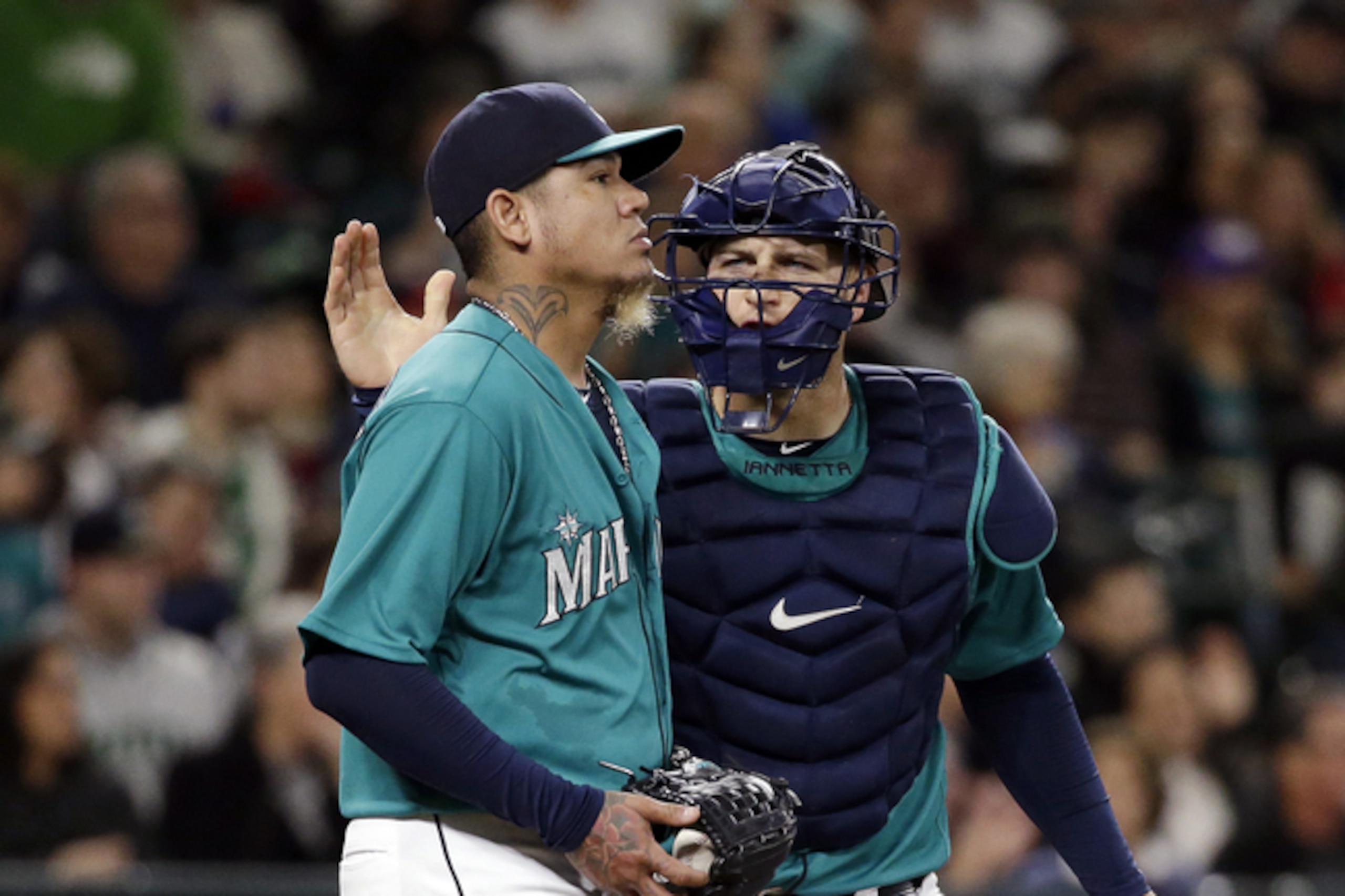 Felix Hernandez (left) and Chris Iannetta
