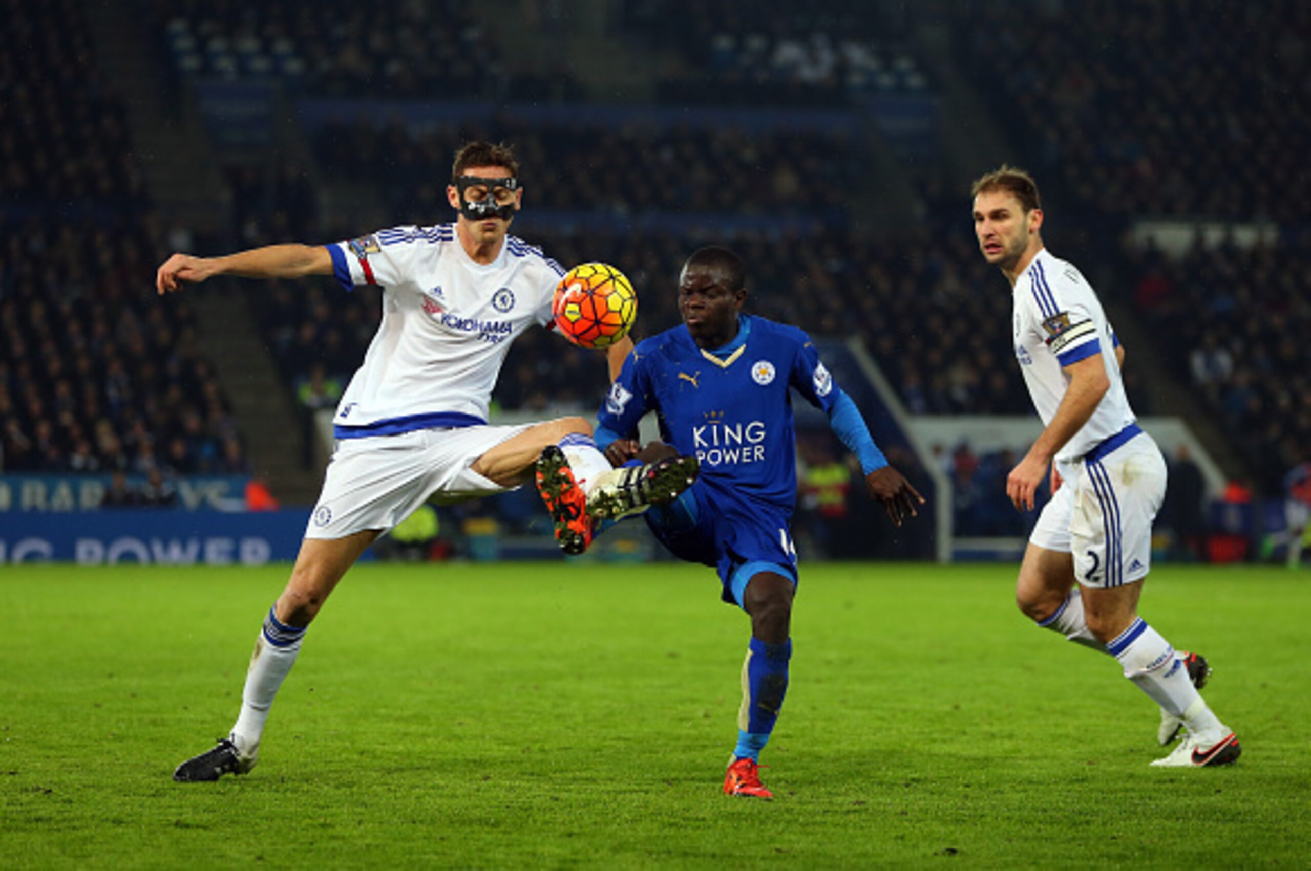 LEICESTER, ENGLAND - DECEMBER 14:  Nemanja Matic of Chelsea battles with Ngolo Kante of Leicester City as Branislav Ivanovic of Chelsea looks on during the Barclays Premier League match between Leicester City and Chelsea at the King Power Stadium on Decem