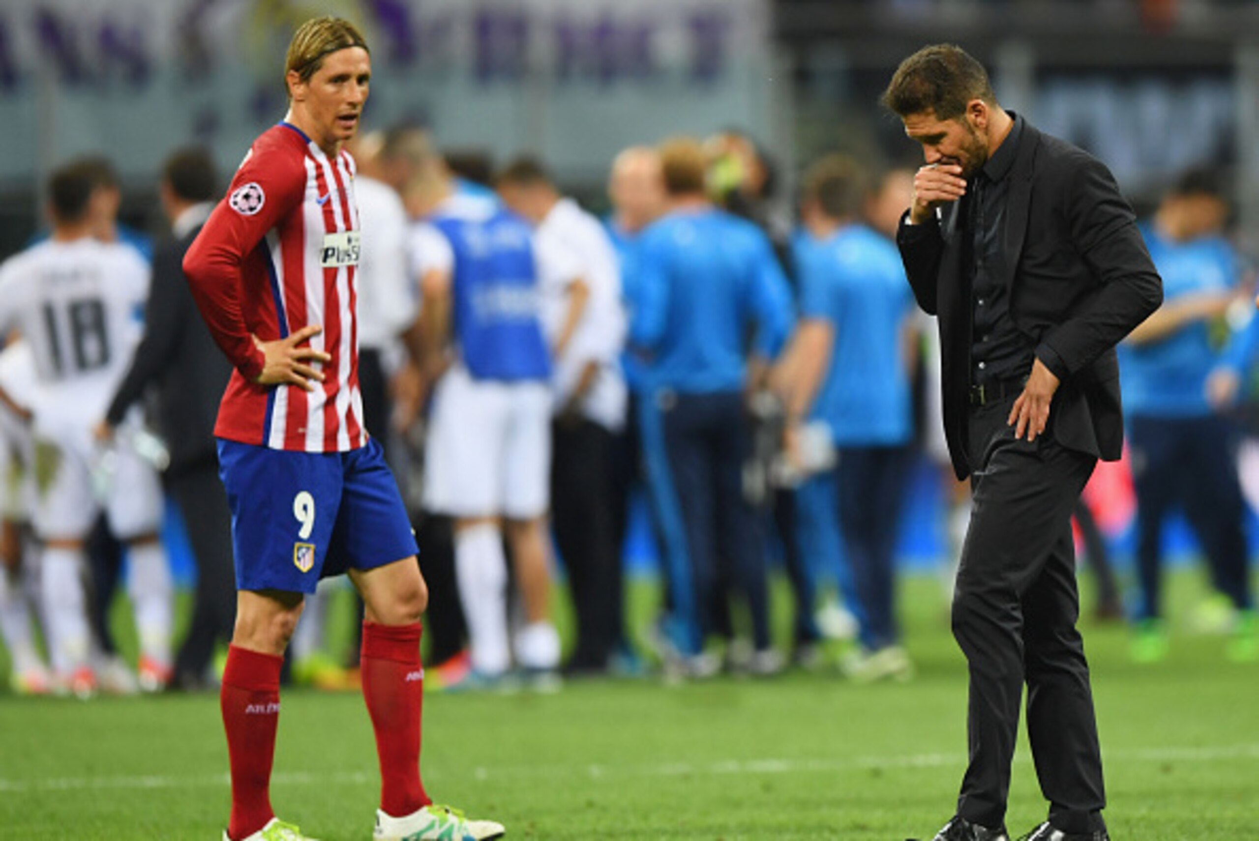 MILAN, ITALY - MAY 28: Fernando Torres of Atletico Madrid and Head coch Diego Simeone are seen during the UEFA Champions League Final match between Real Madrid and Club Atletico de Madrid at Stadio Giuseppe Meazza on May 28, 2016 in Milan, Italy. (Photo MILAN, ITALY - MAY 28: Fernando Torres of Atletico Madrid and Head coch Diego Simeone are seen during the UEFA Champions League Final match between Real Madrid and Club Atletico de Madrid at Stadio Giuseppe Meazza on May 28, 2016 in Milan, Italy. (Photo