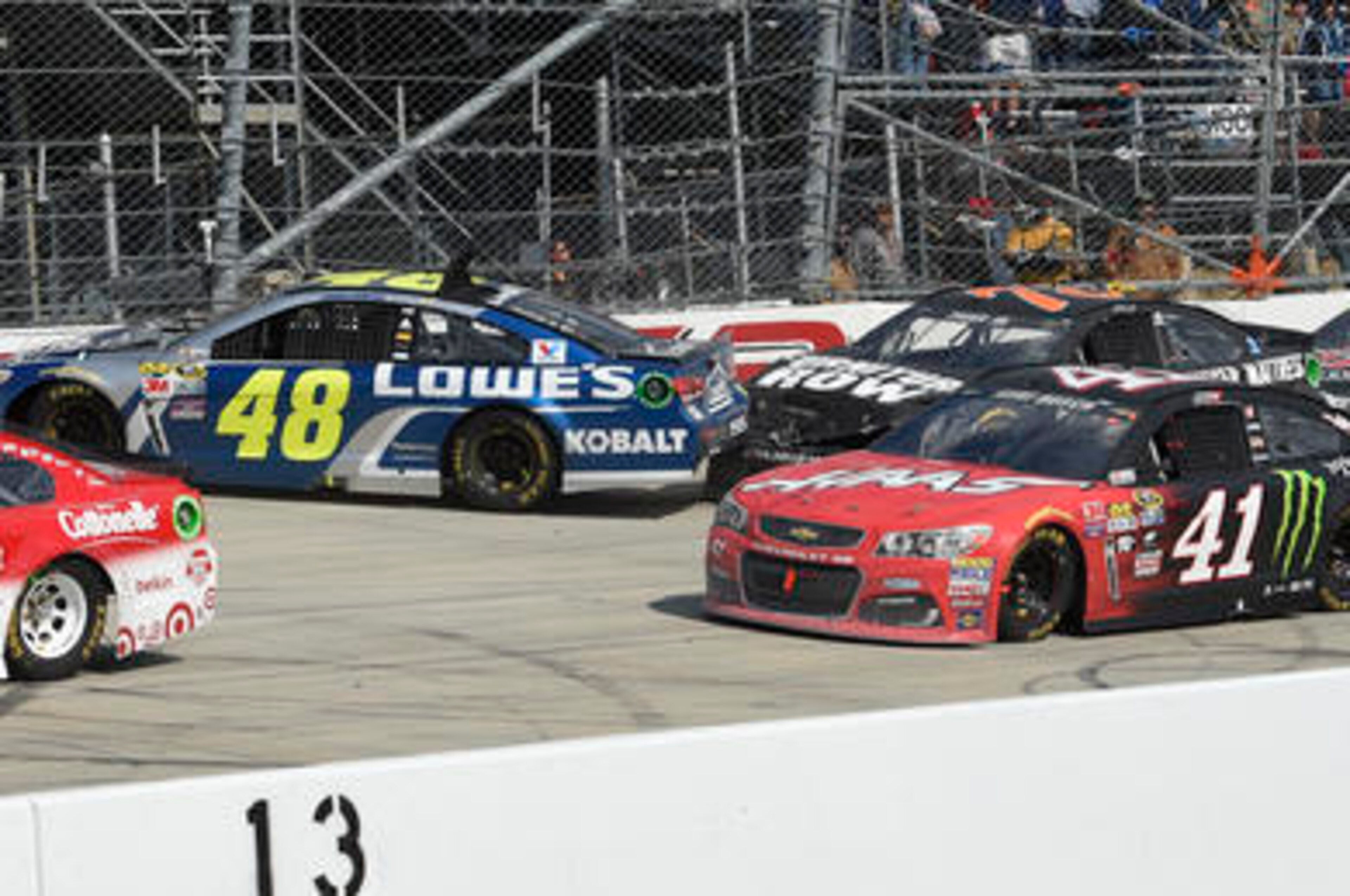 A crash took Jimmie Johnson (48) out of Busch's (41) way.