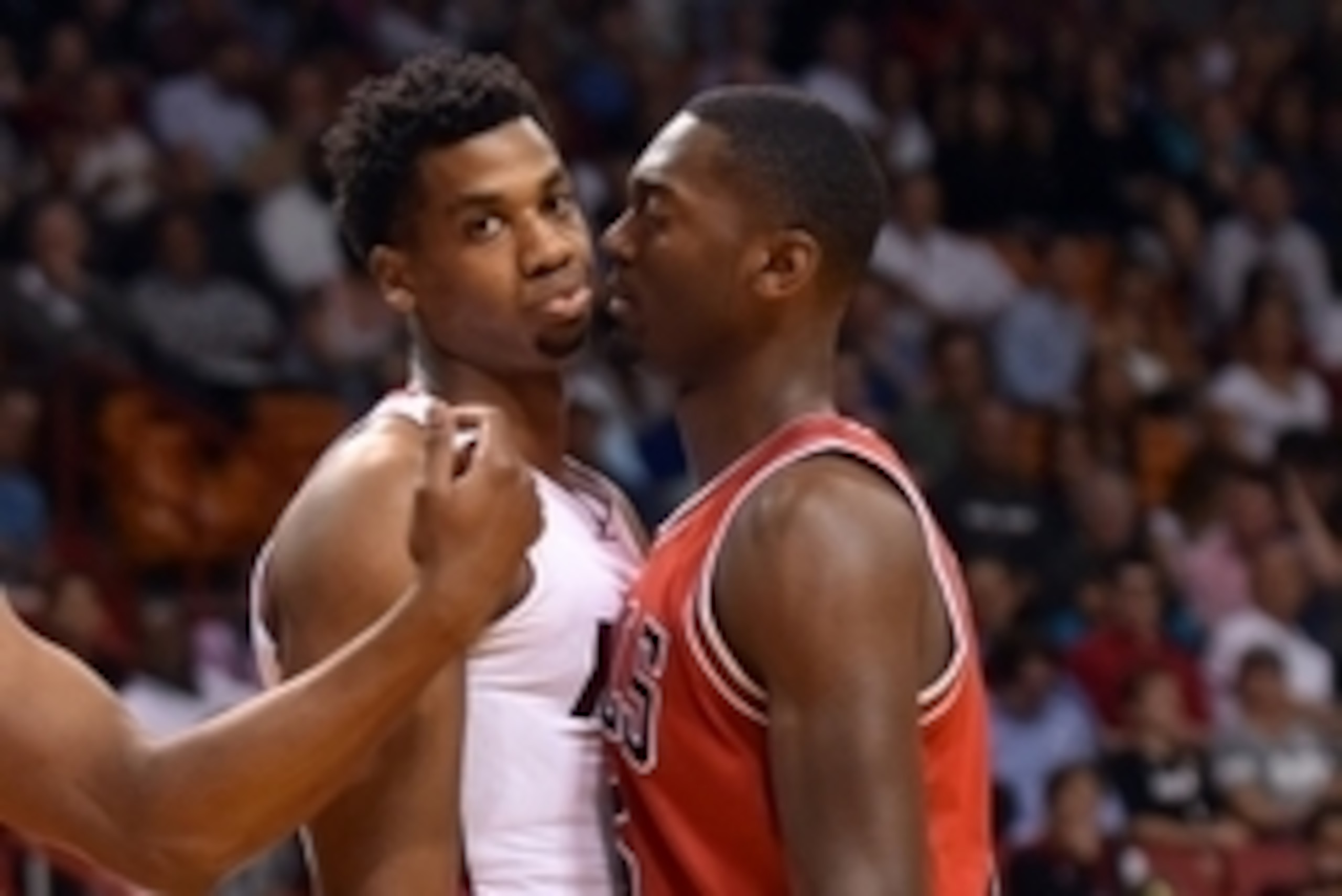 Apr 7, 2016; Miami, FL, USA; Chicago Bulls forward Bobby Portis (5) exchanges words with Miami Heat center Hassan Whiteside (21) during the first half at American Airlines Arena. Mandatory Credit: Steve Mitchell-USA TODAY Sports