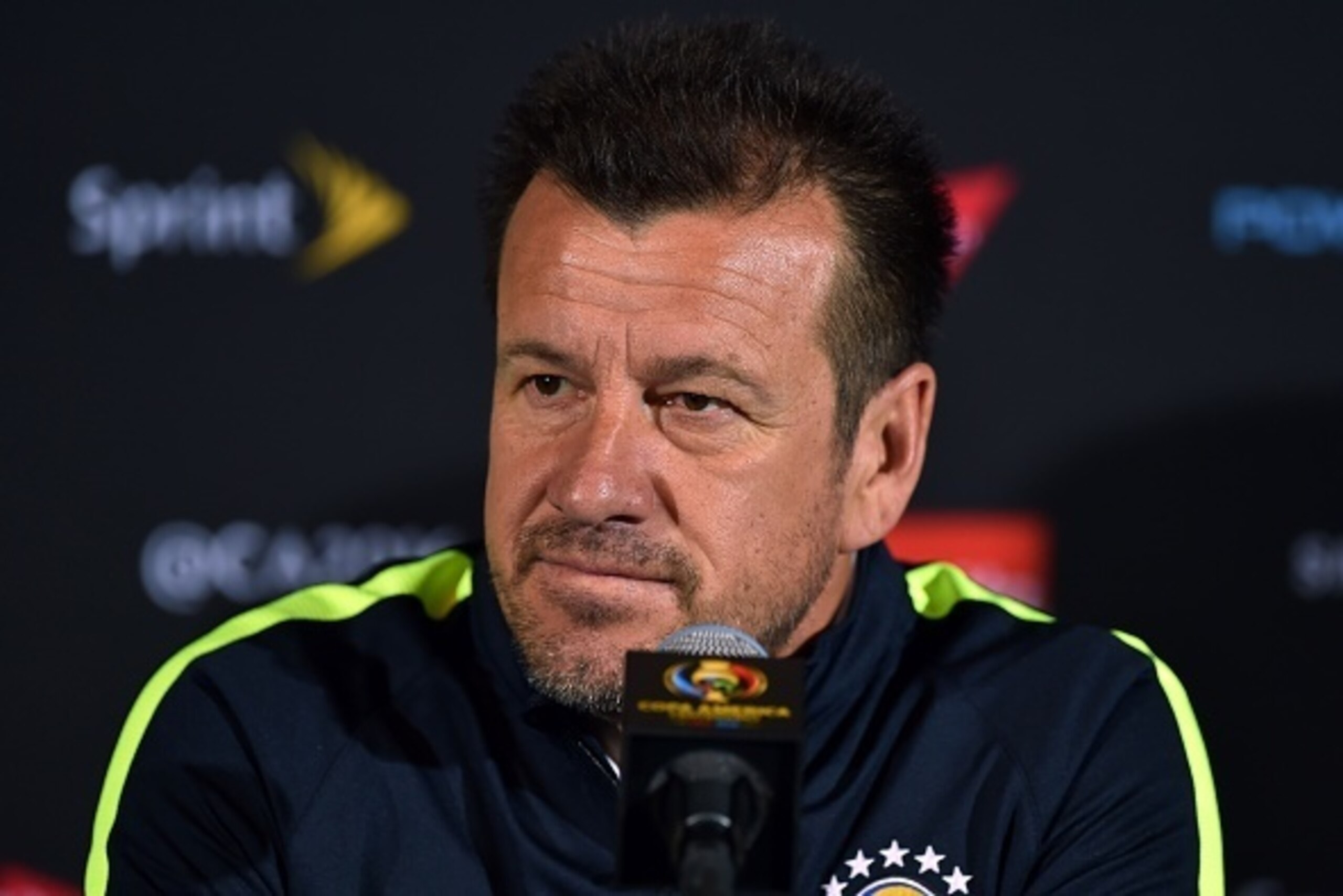 Carlos Caetano Bledorn Verri, Dunga, coach of the Brazil's men's soccer team speaks during a press conference at Camping World Stadium in Orlando, Florida on June 7, 2016, one day before their COPA America 2016 match against Haiti. / AFP / HECTOR RETAMAL 