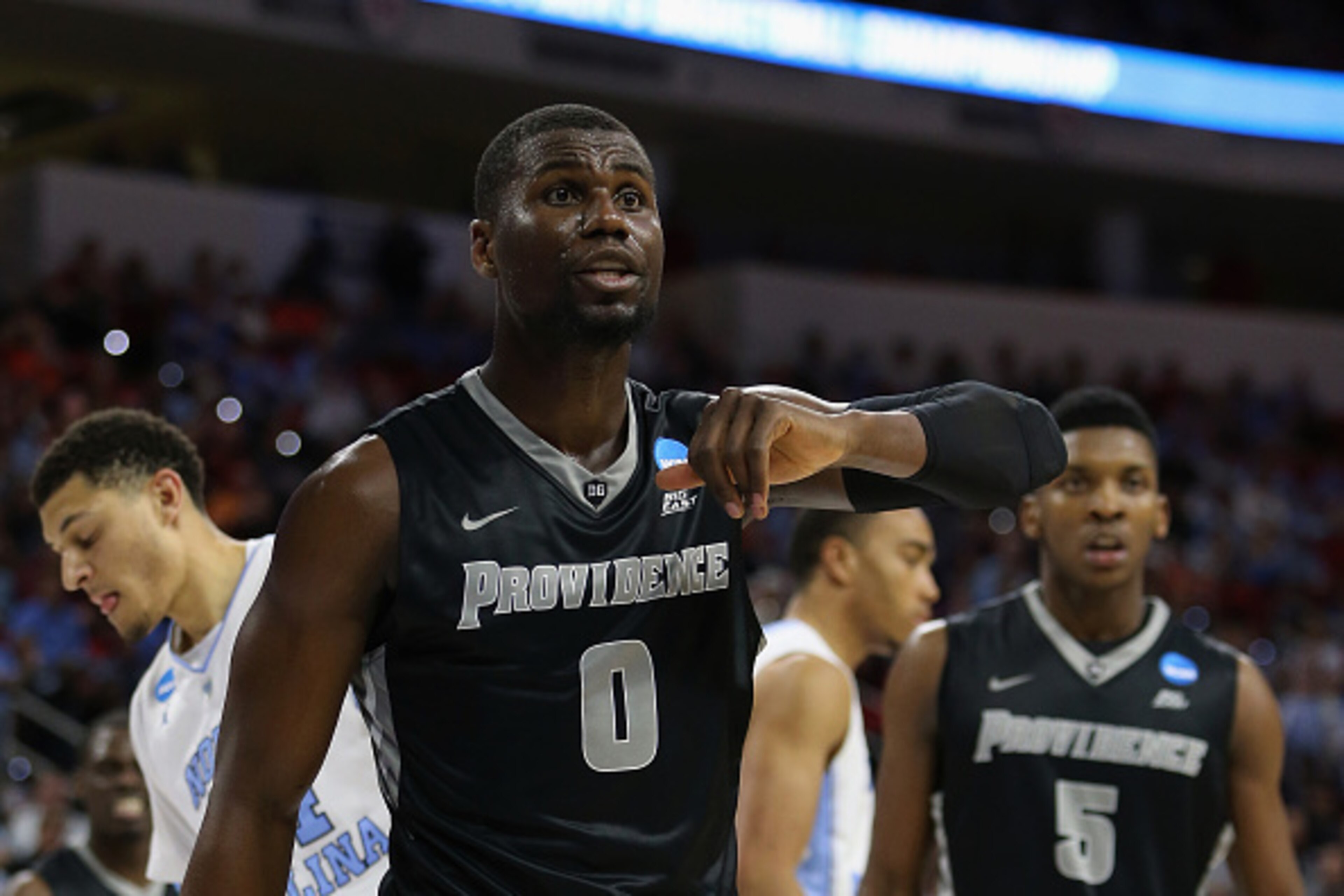 RALEIGH, NC - MARCH 19: Ben Bentil #0 of the Providence Friars reacts against the North Carolina Tar Heels in the second half during the second round of the 2016 NCAA Men's Basketball Tournament at PNC Arena on March 19, 2016 in Raleigh, North Carolina. RALEIGH, NC - MARCH 19: Ben Bentil #0 of the Providence Friars reacts against the North Carolina Tar Heels in the second half during the second round of the 2016 NCAA Men's Basketball Tournament at PNC Arena on March 19, 2016 in Raleigh, North Carolina.