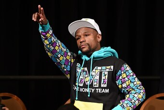 LAS VEGAS, NV - SEPTEMBER 12:  Floyd Mayweather Jr. walks in to his post-fight news conference at MGM Grand Hotel & Casino after he retained his WBC/WBA welterweight titles in a unanimous-decision victory over Andre Berto on September 12, 2015 in Las Vega