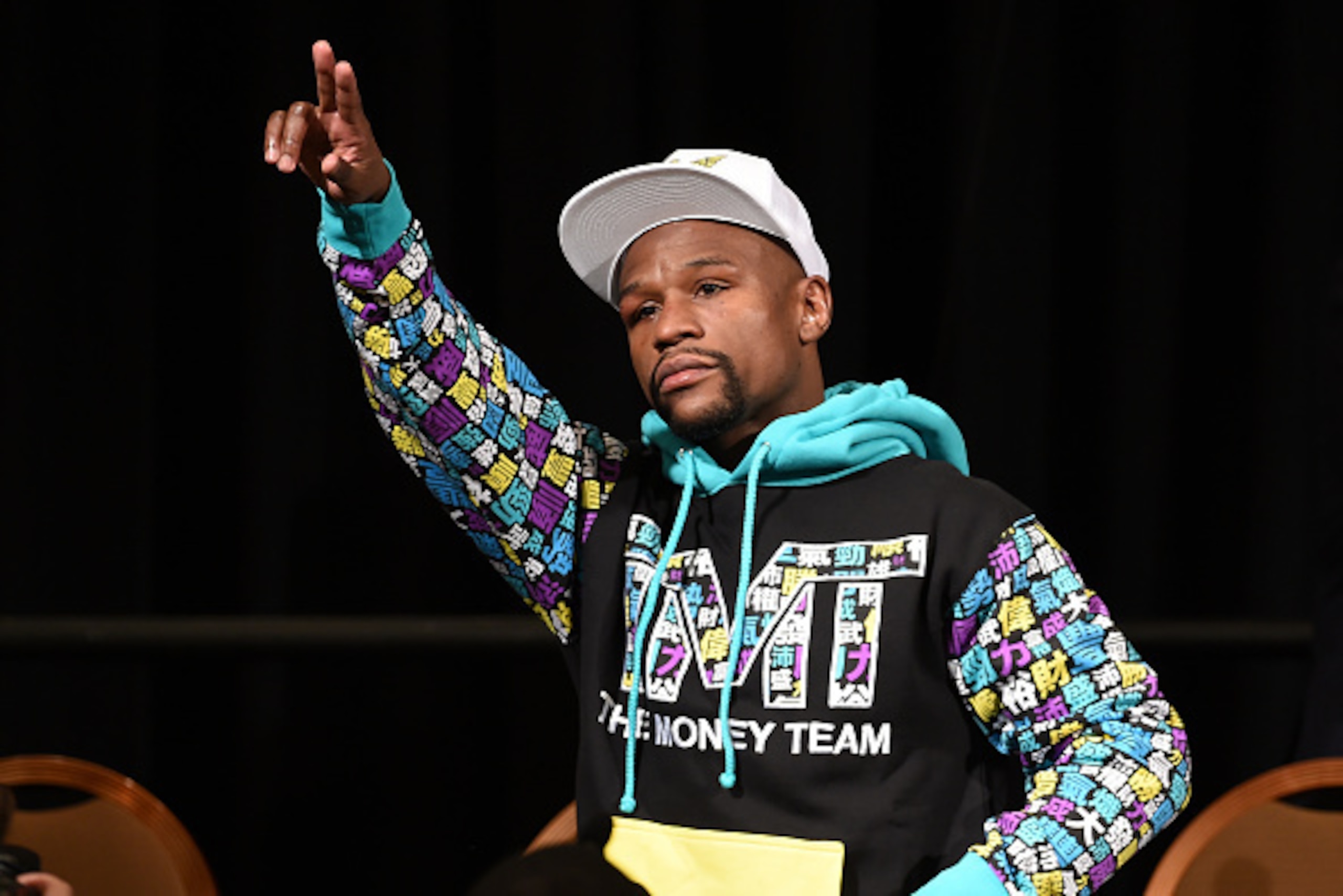 LAS VEGAS, NV - SEPTEMBER 12:  Floyd Mayweather Jr. walks in to his post-fight news conference at MGM Grand Hotel & Casino after he retained his WBC/WBA welterweight titles in a unanimous-decision victory over Andre Berto on September 12, 2015 in Las Vega