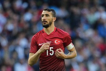 MANCHESTER, ENGLAND - MAY 22: Mehmet Topal of Turkey takes a throw in during the International Friendly match between England and Turkey at Etihad Stadium on May 22, 2016 in Manchester, England. (Photo by Matthew Ashton - AMA/Getty Images)