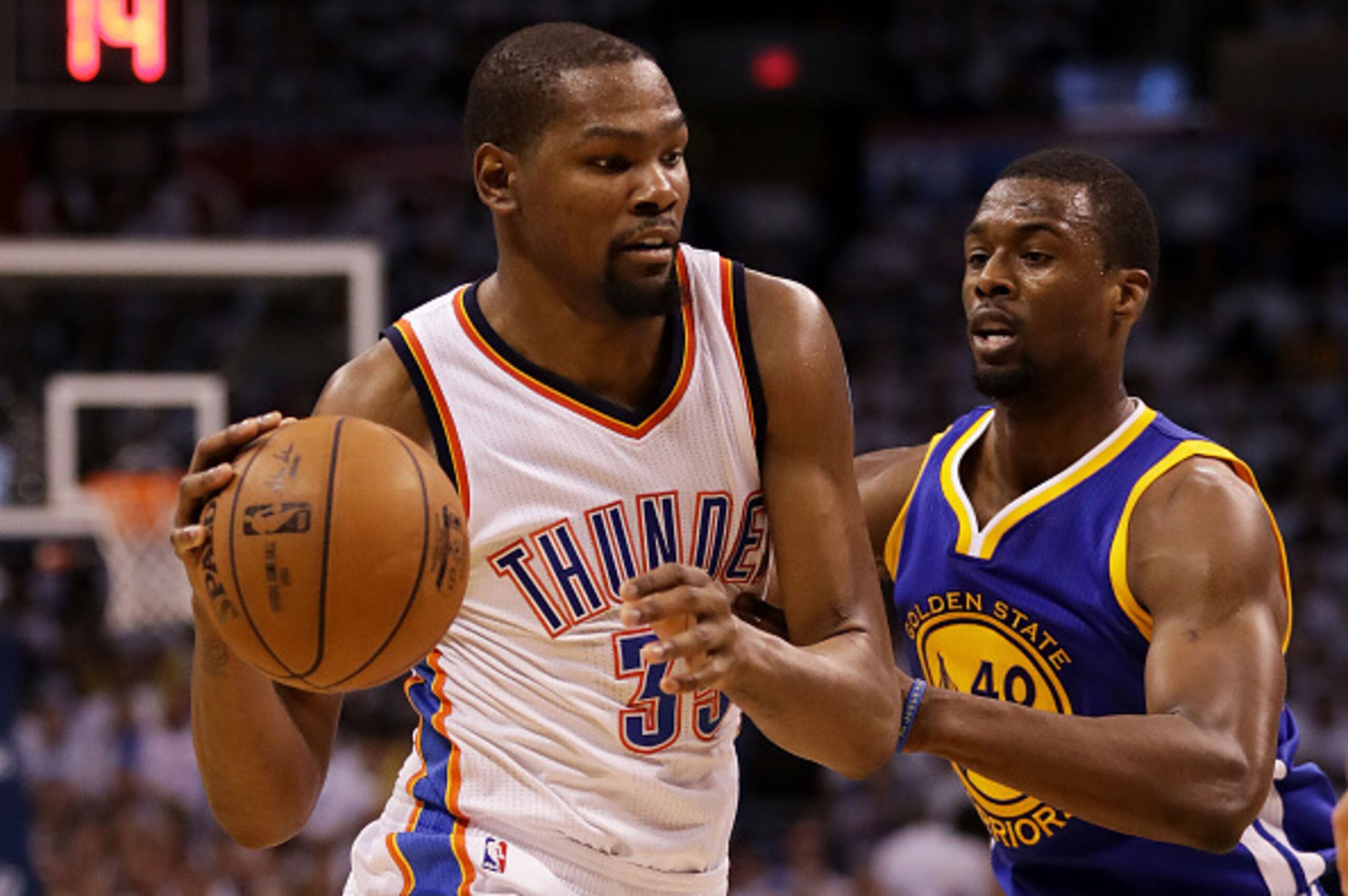 OKLAHOMA CITY, OK - MAY 24:  Kevin Durant #35 of the Oklahoma City Thunder drives against Harrison Barnes #40 of the Golden State Warriors in the third quarter in game four of the Western Conference Finals during the 2016 NBA Playoffs at Chesapeake Energy