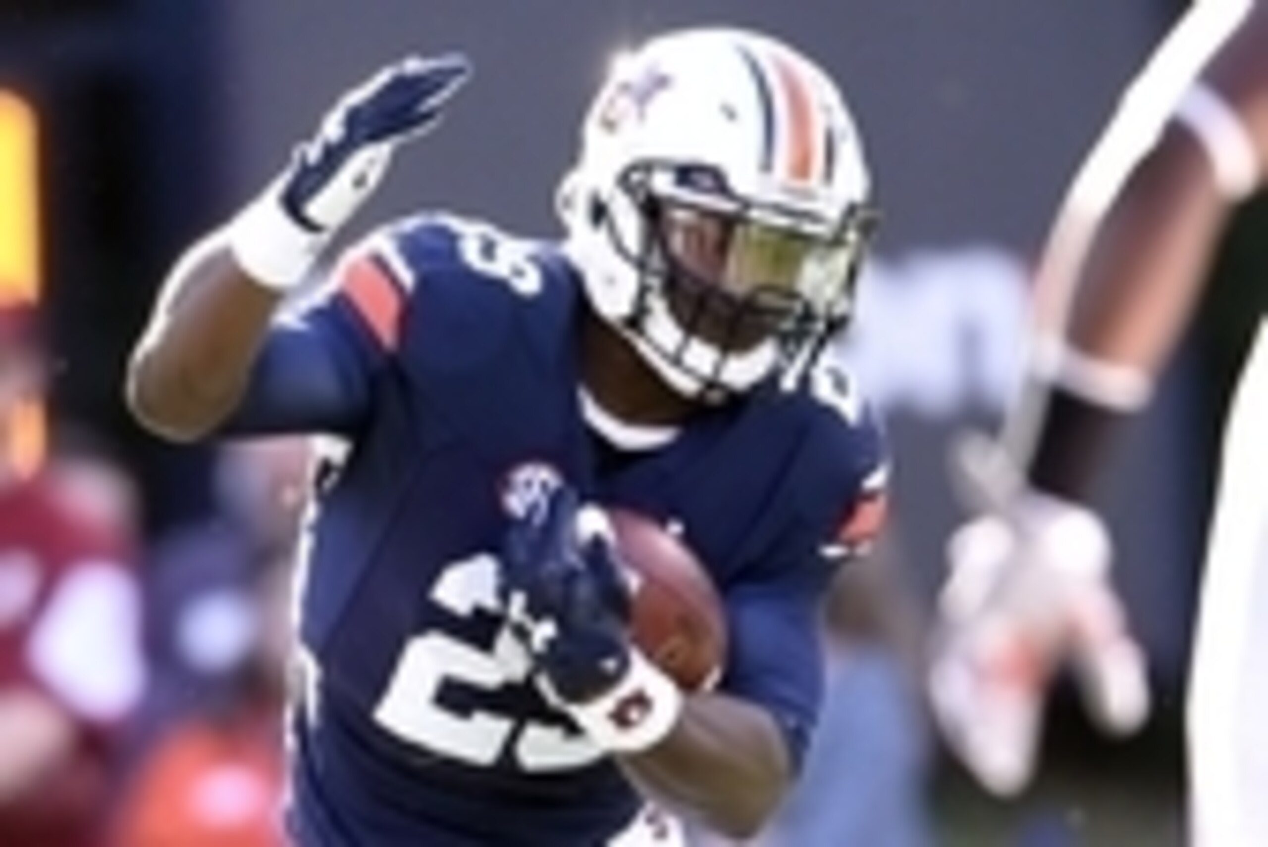 Nov 28, 2015; Auburn, AL, USA; Auburn Tigers running back Jovon Robinson (29) carries the ball past against the Alabama Crimson Tide at Jordan Hare Stadium. Mandatory Credit: RVR Photos-USA TODAY Sports