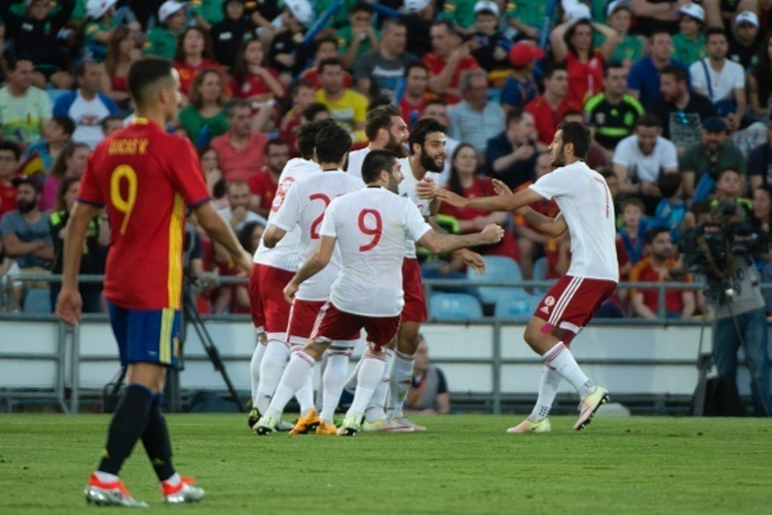 Georgia's midfielder Tornike Okriashvili (2ndR) celebrates with teammates after scoring during the EURO 2016 friendly football match Spain vs Georgia at the Coliseum Alfonso Perez stadium in Getafe, on June 7, 2016, in preparation for the upcoming Euro 20