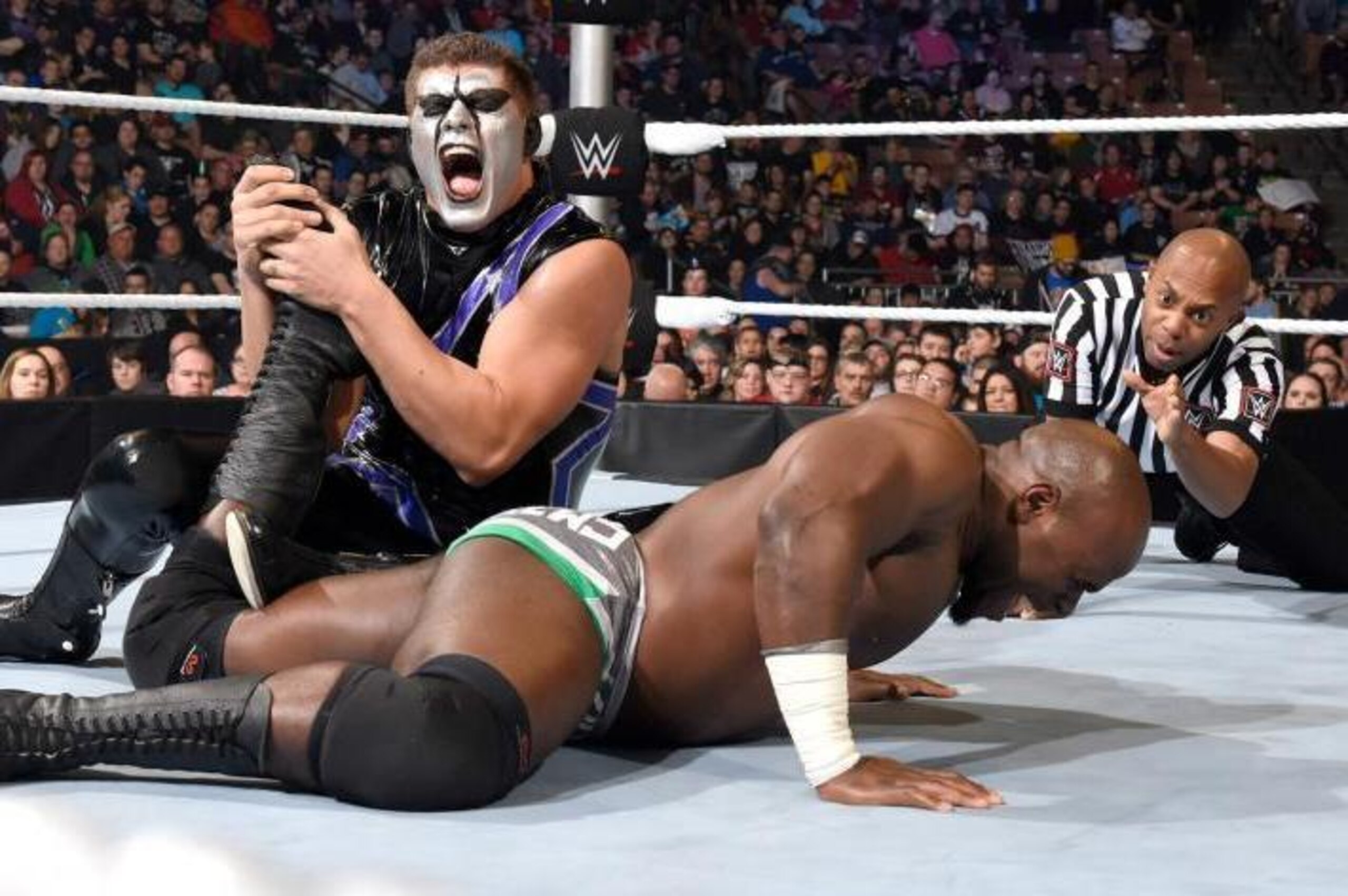 Cody Rhodes (as Stardust) in control of Apollo Crews.