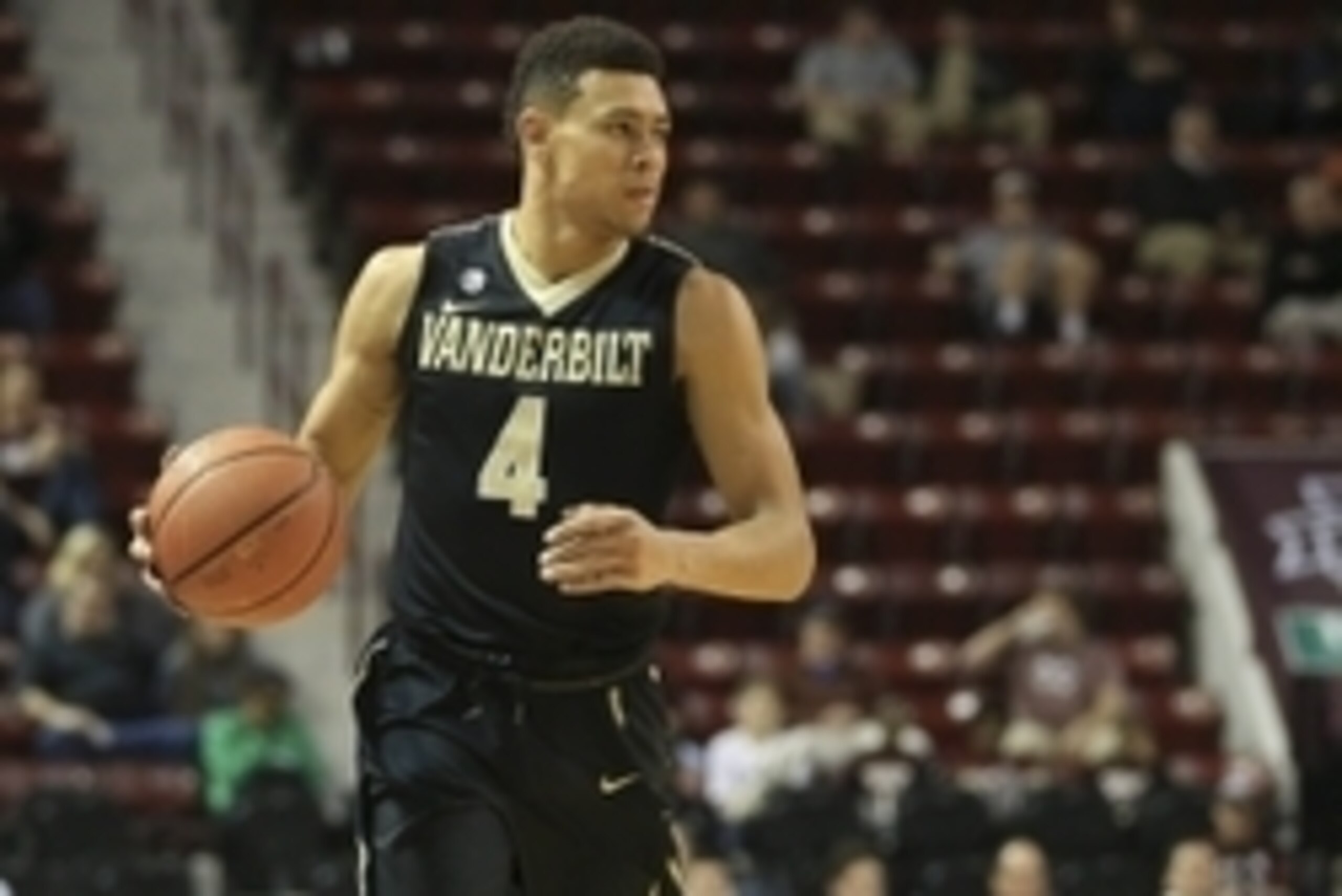 Feb 16, 2016; Starkville, MS, USA; Vanderbilt Commodores guard Wade Baldwin IV (4) brings the ball up court during the first half against the Mississippi State Bulldogs at Humphrey Coliseum. Mandatory Credit: Spruce Derden-USA TODAY Sports