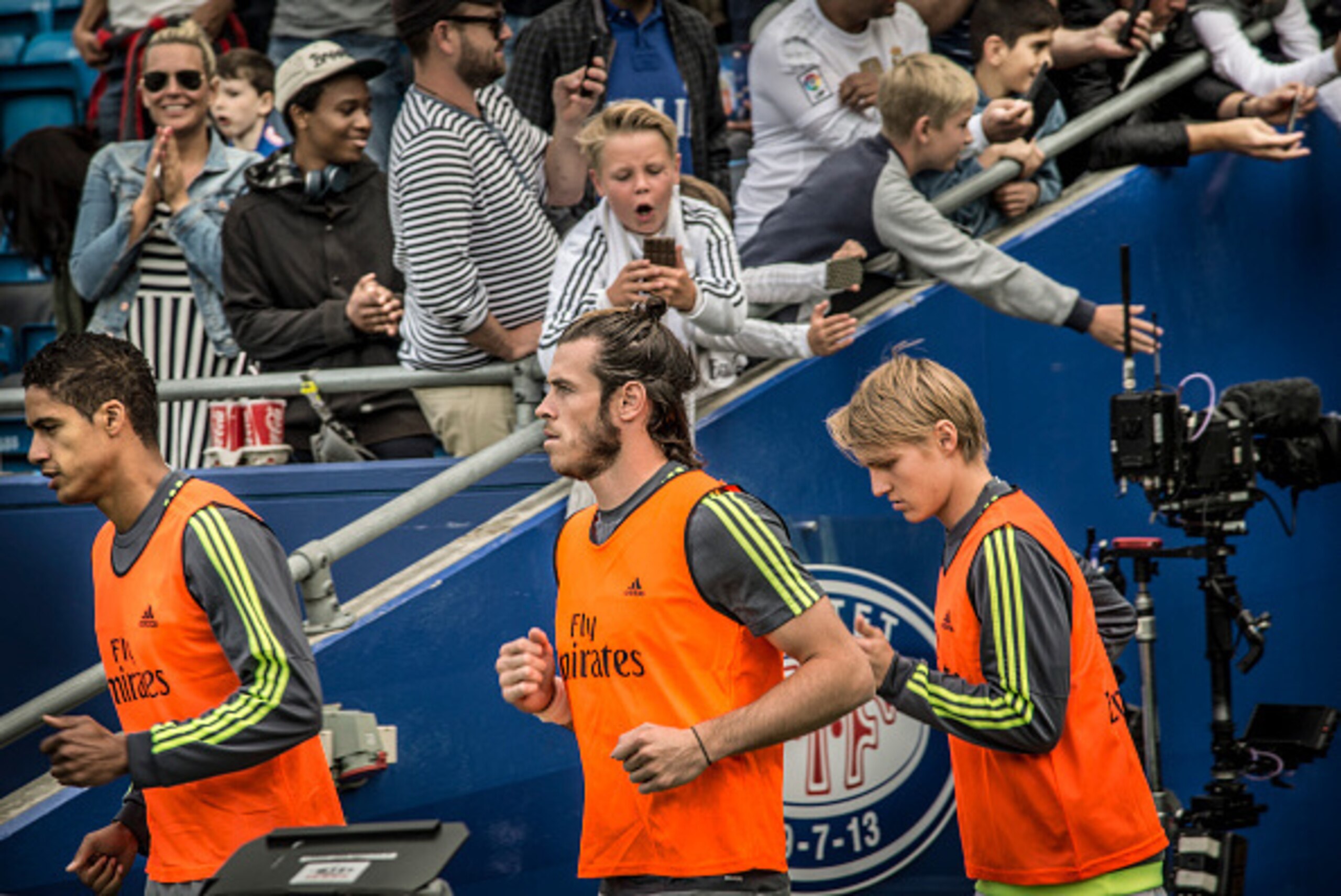 OSLO, NORWAY - August 9:  Raphael Varane, Gareth Bale and Martin Odegaard of Real Madrid during training/ heating before the Pre-season Friendly  match between Vaalerenga and Real Madrid at Ullevaal Stadion on August  9, 2015 in Oslo, Norway.  (Photo by T