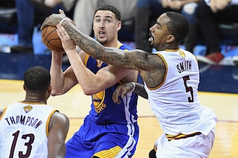 CLEVELAND, OH - JUNE 08:  J.R. Smith #5 of the Cleveland Cavaliers defends Klay Thompson #11 of the Golden State Warriors during the second half in Game 3 of the 2016 NBA Finals at Quicken Loans Arena on June 8, 2016 in Cleveland, Ohio. NOTE TO USER: User