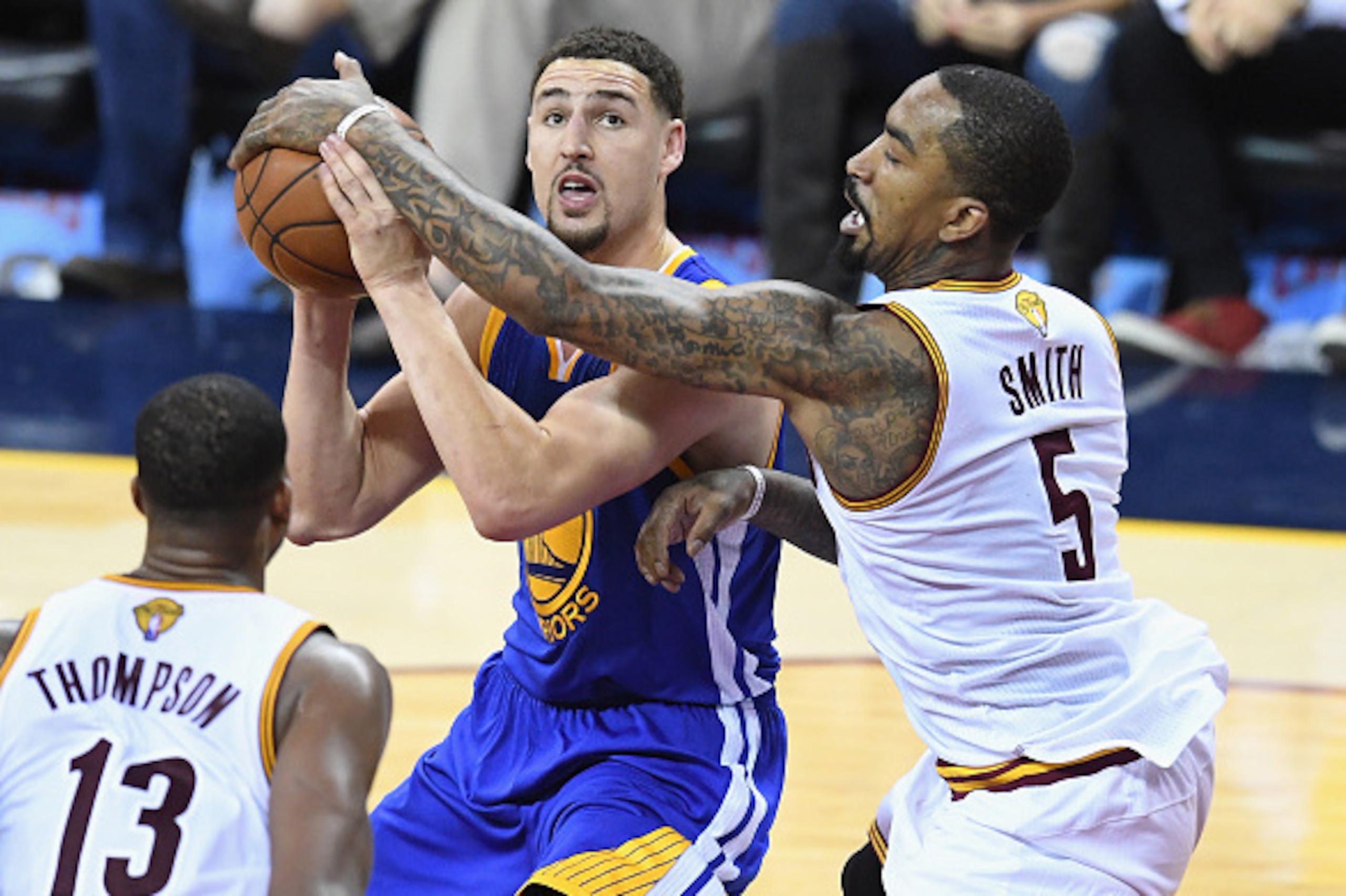 CLEVELAND, OH - JUNE 08:  J.R. Smith #5 of the Cleveland Cavaliers defends Klay Thompson #11 of the Golden State Warriors during the second half in Game 3 of the 2016 NBA Finals at Quicken Loans Arena on June 8, 2016 in Cleveland, Ohio. NOTE TO USER: User