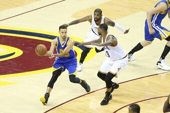 CLEVELAND, OH - JUNE 5: Stephen Curry #30 of the Golden State Warriors passes the ball against the Cleveland Cavaliers during Game Three of the 2016 NBA Finals on June 8, 2016 at Quicken Loans Arena in Cleveland, Ohio. NOTE TO USER: User expressly acknowl