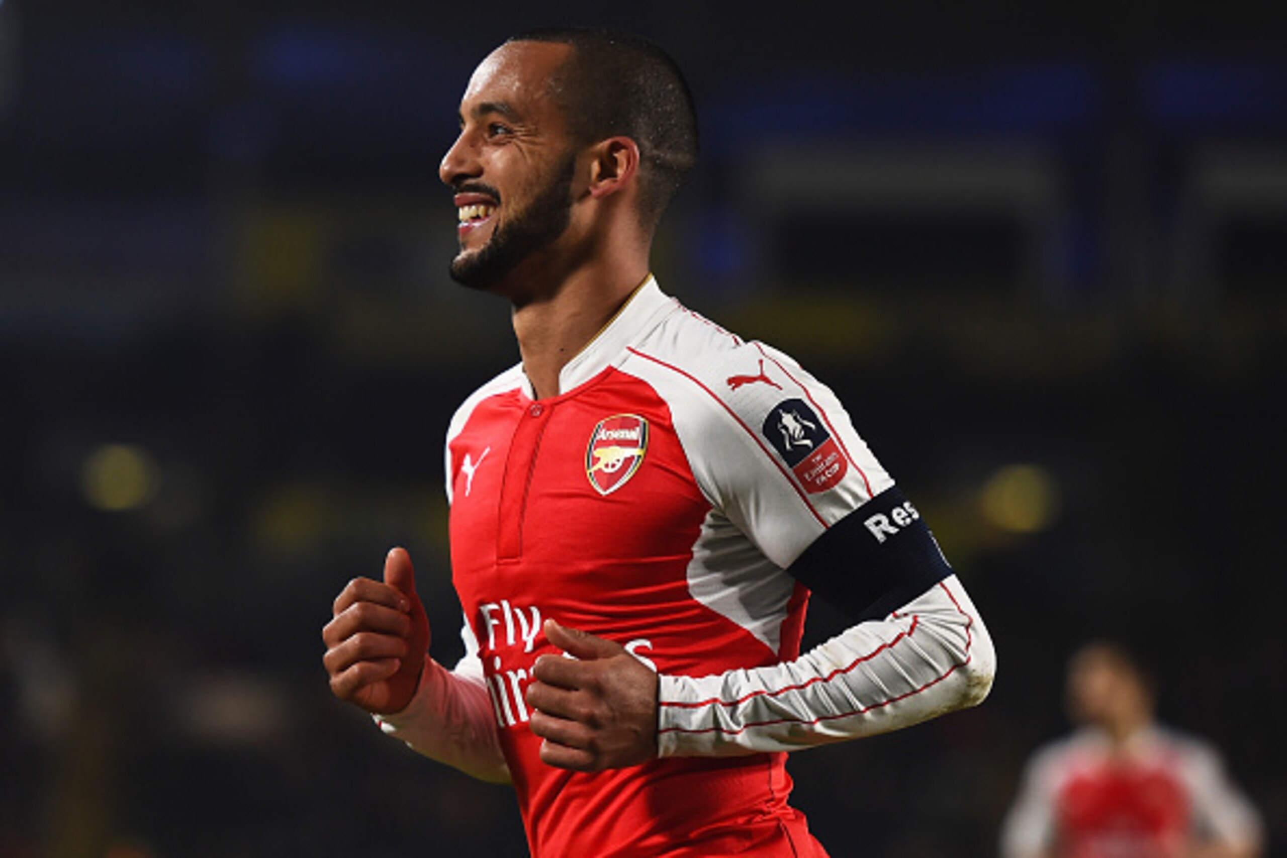 HULL, ENGLAND - MARCH 08:  Theo Walcott of Arsenal celebrates scoring his team's fourth goal during the Emirates FA Cup Fifth Round Replay match between Hull City and Arsenal at KC Stadium on March 8, 2016 in Hull, England.  (Photo by Laurence Griffiths/G