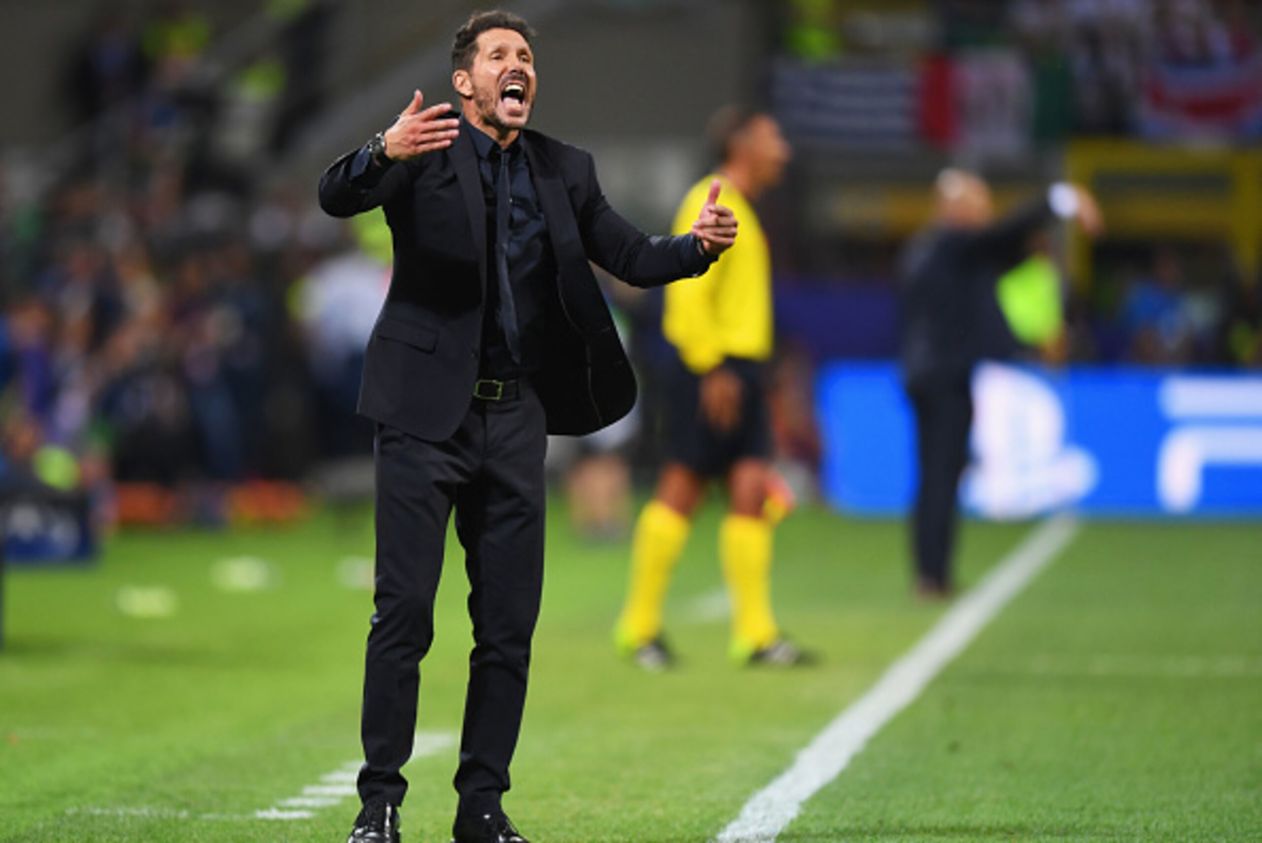 MILAN, ITALY - MAY 28:  Head coach Diego Simeone of Atletico Madrid urges on his side during the UEFA Champions League Final match between Real Madrid and Club Atletico de Madrid at Stadio Giuseppe Meazza on May 28, 2016 in Milan, Italy.  (Photo by Shaun 