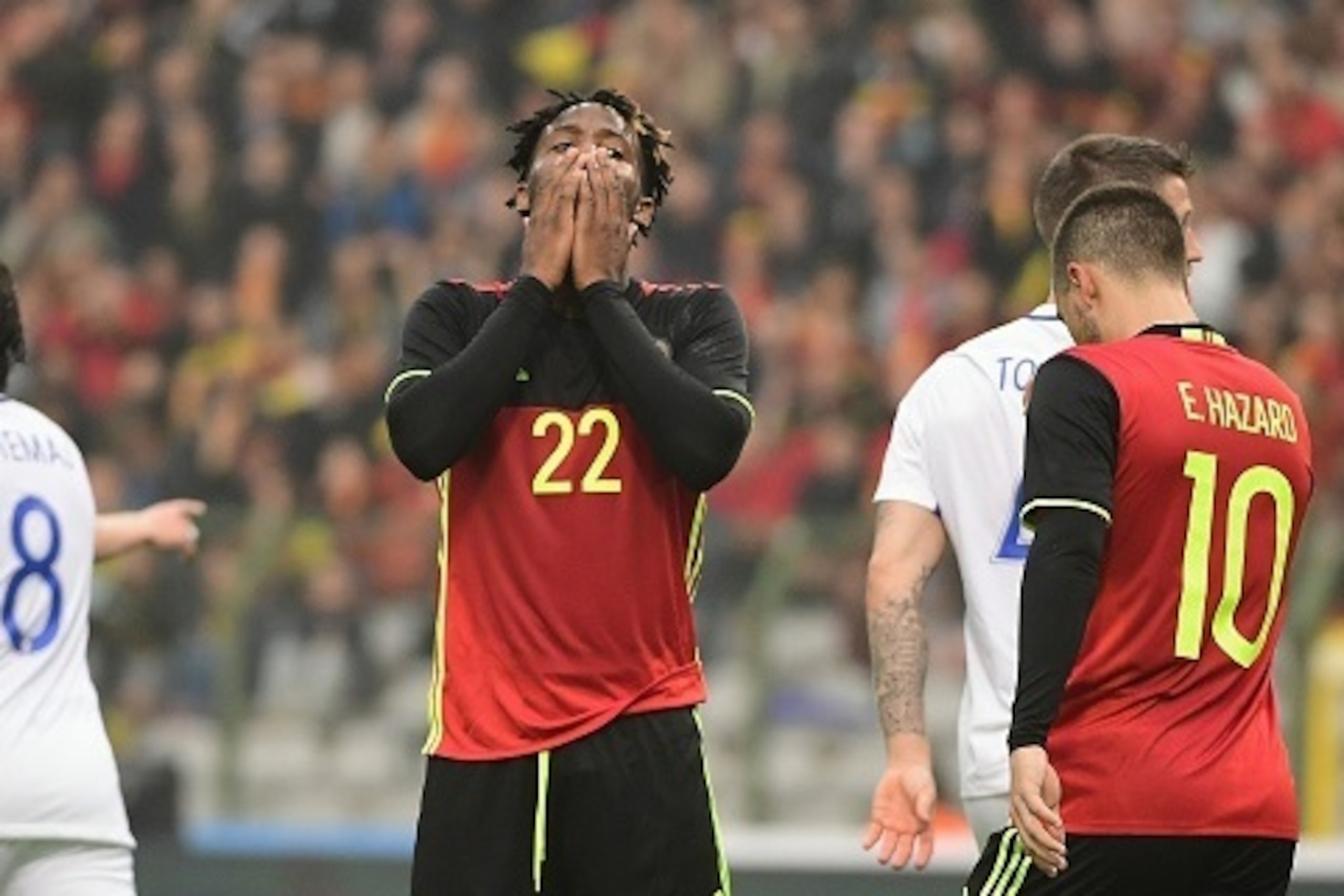 Belgium's Michy Batshuayi (C) reacts after missing a header during a friendly match between Belgium and Finland at the King Baudouin Stadium in Brussels, on June 1, 2016, ahead of the Euro 2016. / AFP / EMMANUEL DUNAND        (Photo credit should read EMM