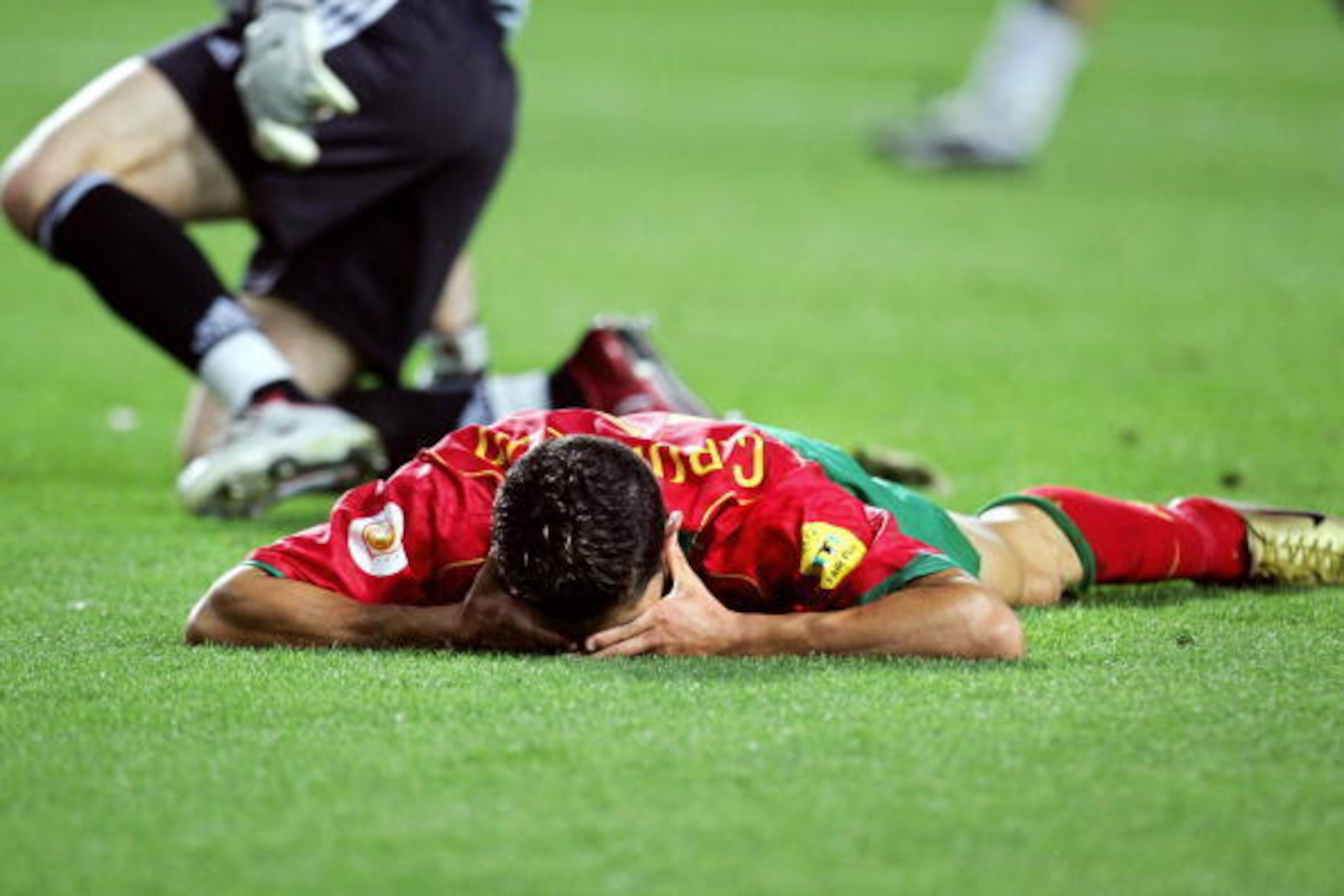 LISBON, Portugal: Portuguese forward Cristiano Ronaldo reacts after missing a chance to score, 04 July 2004 at the Luz stadium in Lisbon, during the Euro 2004 final match between Portugal and Greece at the European Nations football championship in Portug LISBON, Portugal: Portuguese forward Cristiano Ronaldo reacts after missing a chance to score, 04 July 2004 at the Luz stadium in Lisbon, during the Euro 2004 final match between Portugal and Greece at the European Nations football championship in Portug
