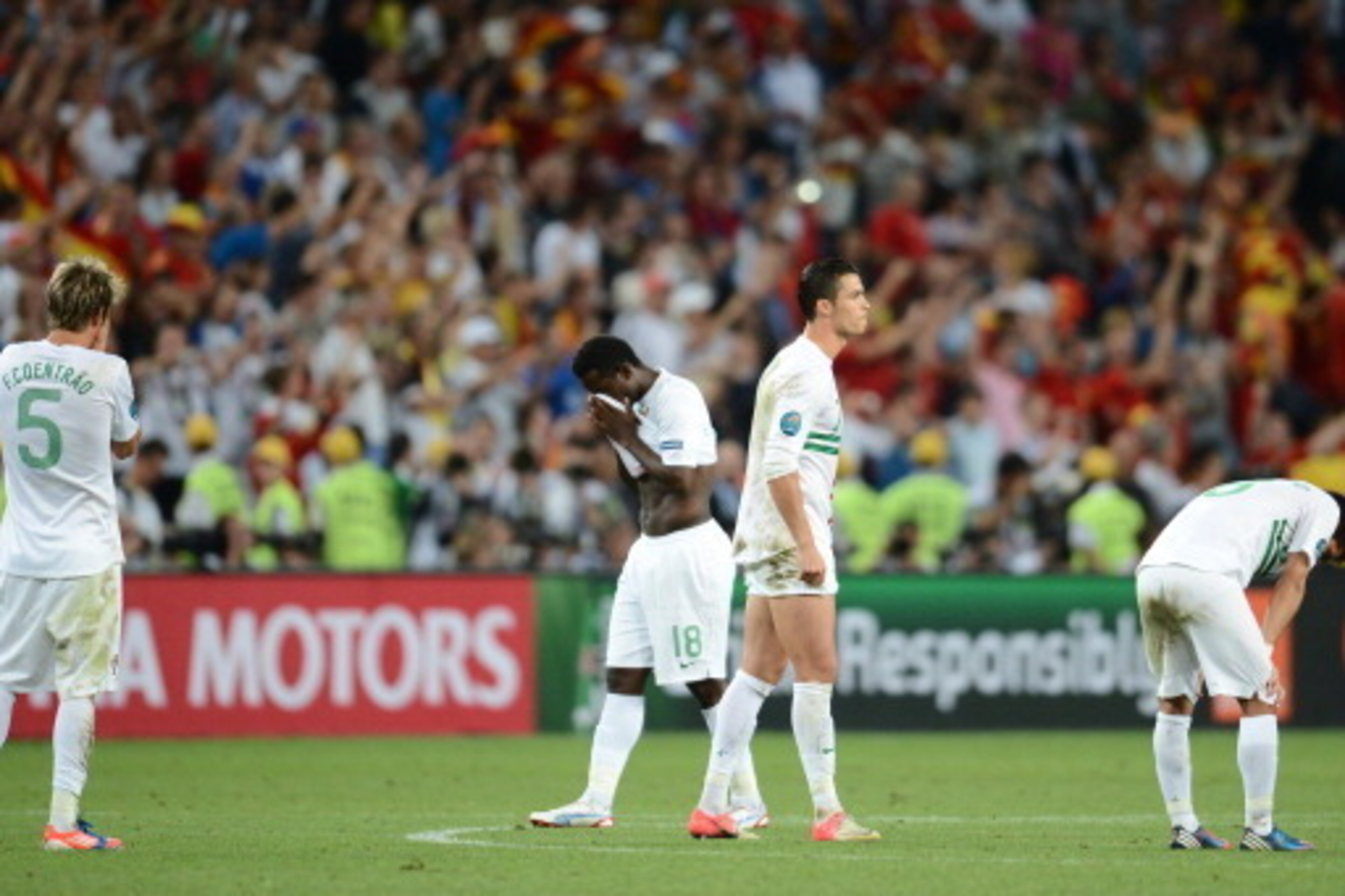 (from left) Portuguese defender Fabio Coentrao, Portuguese forward Silvestre Varela, Portuguese forward Cristiano Ronaldo and Portuguese midfielder Joao Moutinho look dejected at the end of the Euro 2012 football championships semi-final match Portugal vs