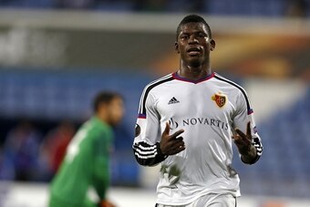 Basel's forward Breel Embolo celebrates his goal during the UEFA Europa League group I football match CF Os Belenenses vs FC Basel at the Restelo stadium in Lisbon on November 5, 2015.   AFP PHOTO/ JOSE MANUEL RIBEIRO        (Photo credit should read JOSE