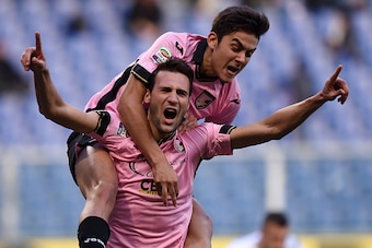 GENOA, ITALY - JANUARY 25:  Franco Vazquez of Palermo celebrates with Paulo Dybala after scoring the equalizing goal (1-1) during the Serie A match between UC Sampdoria and US Citta di Palermo at Stadio Luigi Ferraris on January 25, 2015 in Genoa, Italy. 