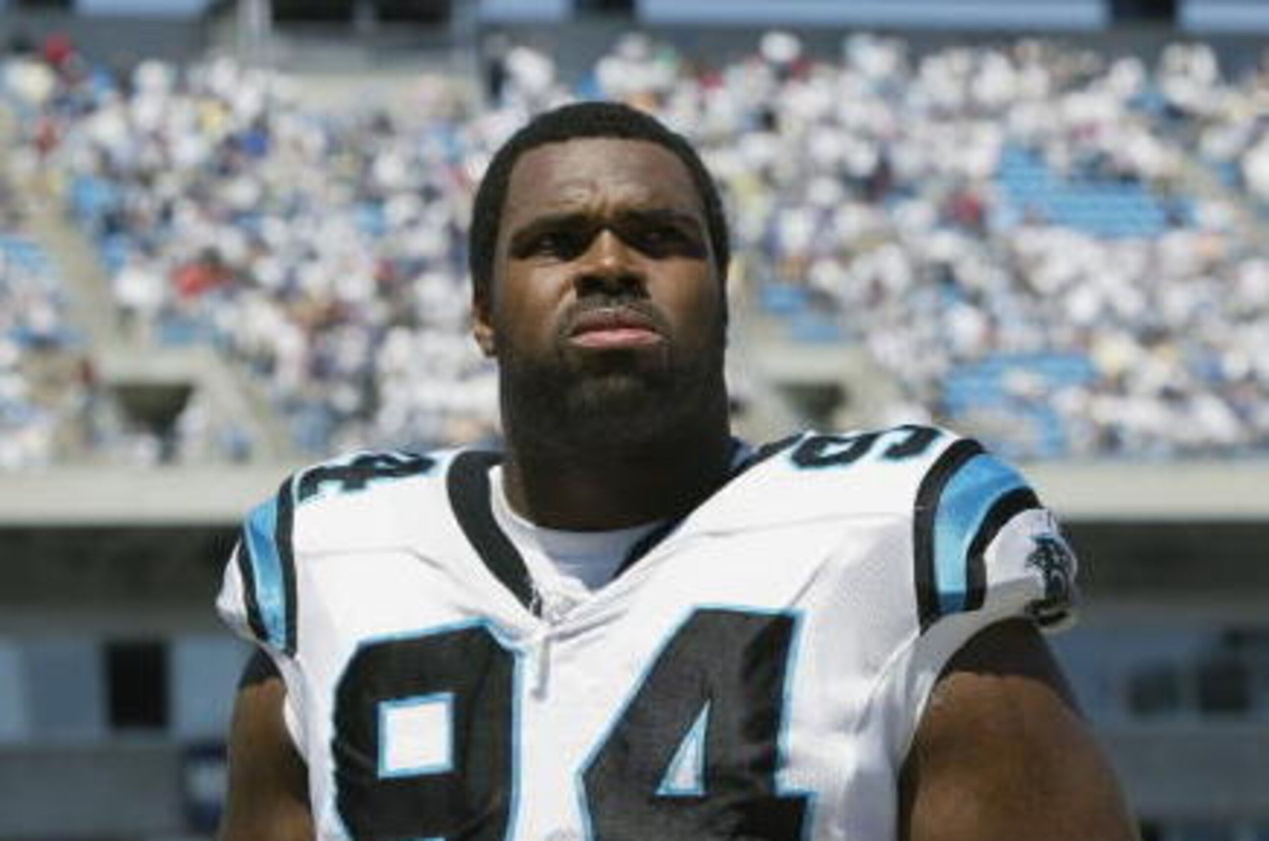 CHARLOTTE, NC - SEPTEMBER 8:  Sean Gilbert #94 of the Carolina Panthers looks on during the game against the Baltimore Ravens on September 8, 2002 at Ericsson Stadium in Charlotte, North Carolina.  The Panthers defeated the Ravens 10-7. (Photo by Craig Jo