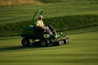 OAKMONT, PA - JUNE 13:  Members of the grounds crew operate mowers during the 107th U.S. Open Championship at Oakmont Country Club on June 13, 2007 in Oakmont, Pennsylvania.  (Photo by Getty Images for John Deere)