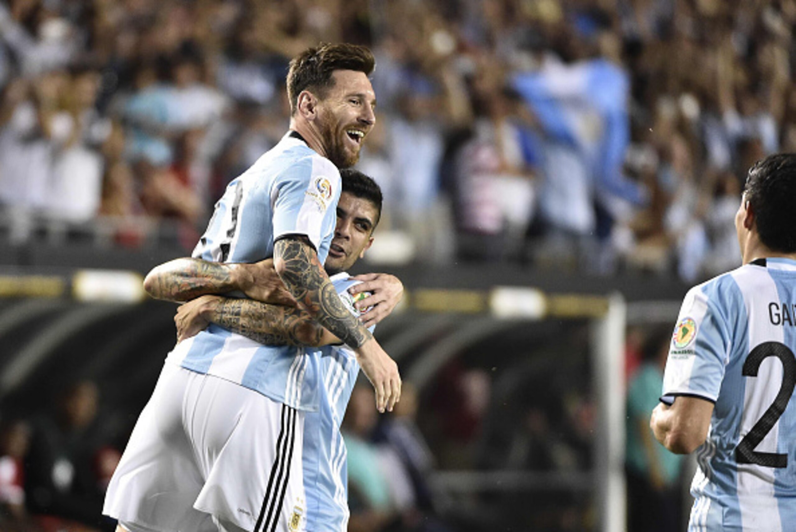 Argentina's Lionel Messi (L) celebrates with teammate Ever Banega after scoring a free-kick against Panama during the Copa America Centenario football tournament in Chicago, Illinois, United States, on June 10, 2016.  / AFP / OMAR TORRES        (Photo cre