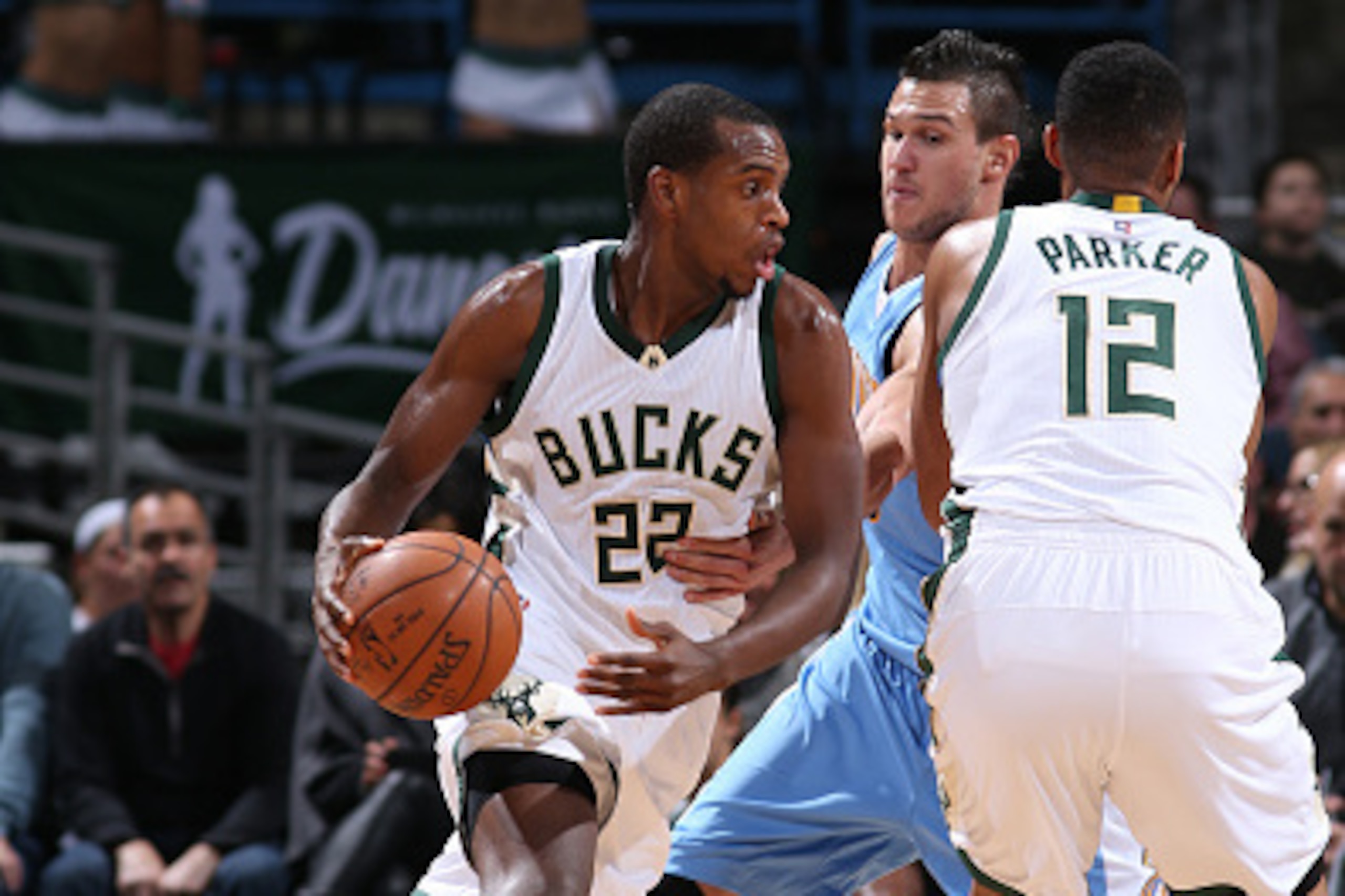 Milwaukee, WI - NOVEMBER 30: Khris Middleton #22 of the Milwaukee Bucks handles the ball against the Denver Nuggets on November 30, 2015 at the BMO Harris Bradley Center in Milwaukee, Wisconsin. NOTE TO USER: User expressly acknowledges and agrees that, b