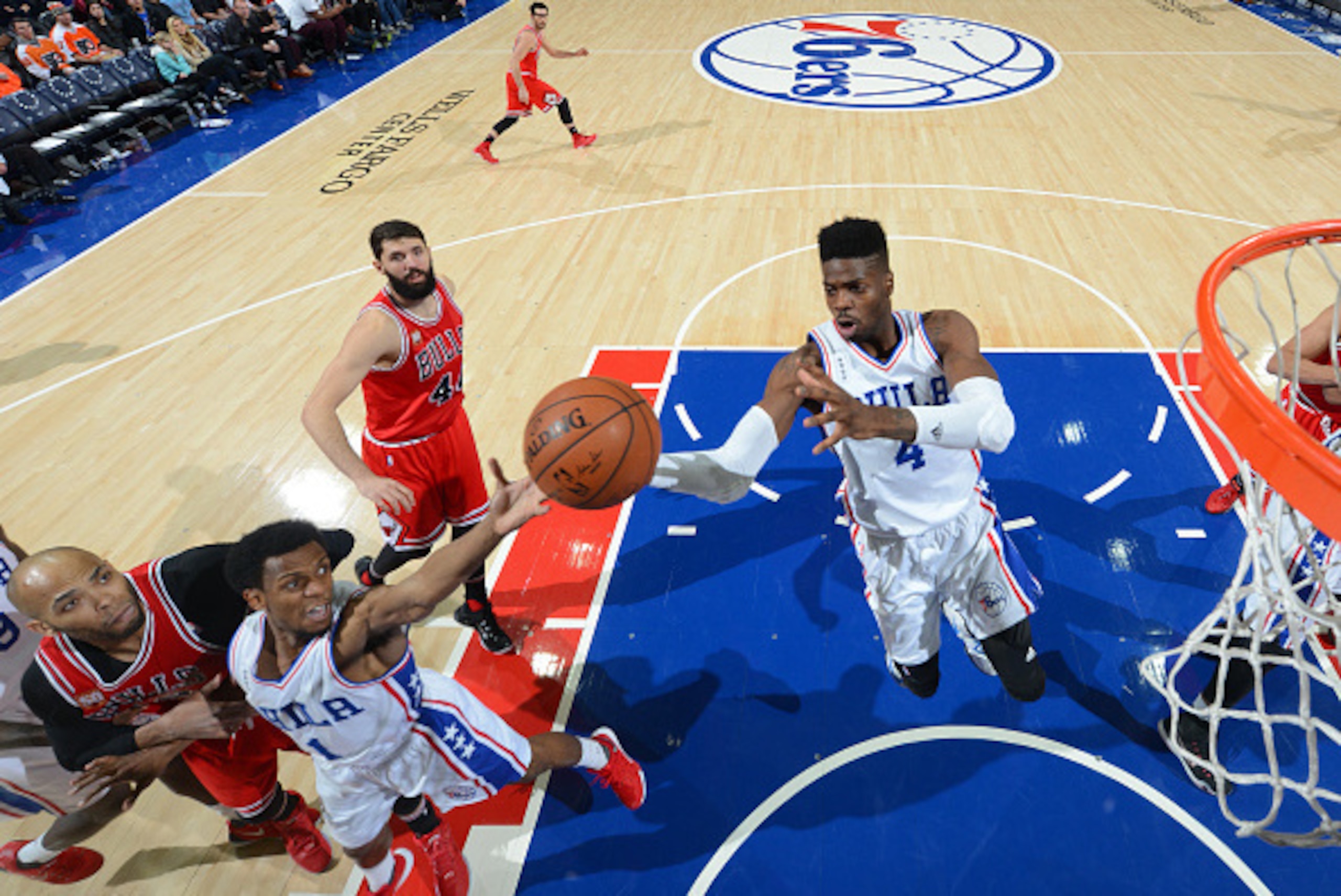 PHILADELPHIA,PA - JANUARY 14: Nerlens Noel #4 of the Philadelphia 76ers grabs the rebound against the Chicago Bulls at Wells Fargo Center on January 14, 2015 in Philadelphia, Pennsylvania NOTE TO USER: User expressly acknowledges and agrees that, by downl