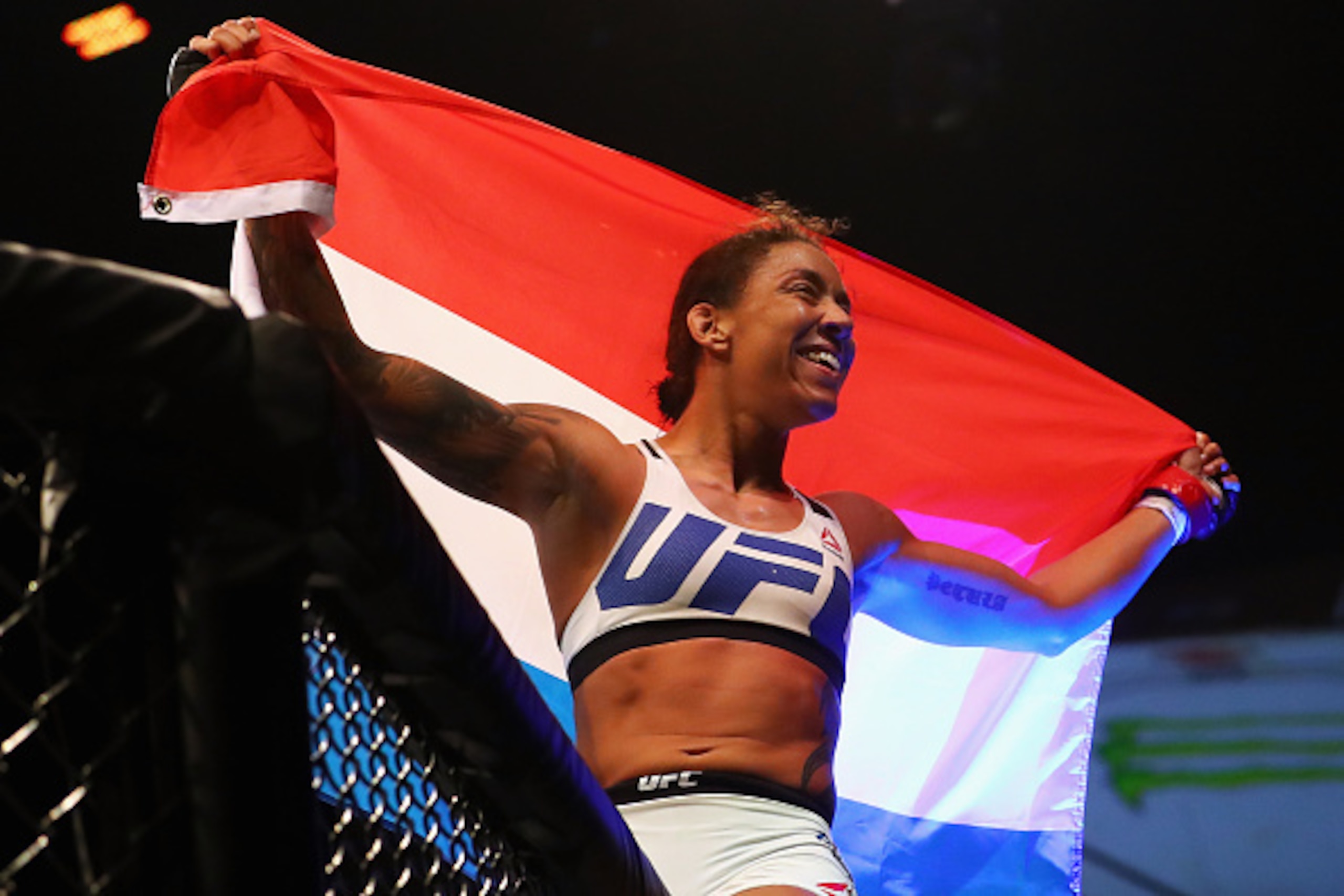 ROTTERDAM, NETHERLANDS - MAY 08:  Germaine de Randamie of the Netherlands celebrates victory over Anna Elmose of Denmark after their Women's Bantamweight bout during the UFC Fight Night 87 at Ahoy on May 8, 2016 in Rotterdam, Netherlands.  (Photo by Dean 