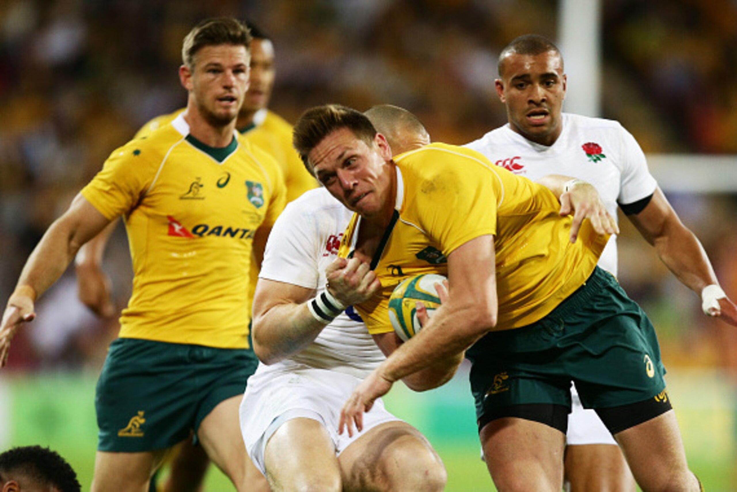 BRISBANE, AUSTRALIA - JUNE 11:  Dane Haylett-Petty of the Wallabies is tackled during the International Test match between the Australian Wallabies and England at Suncorp Stadium on June 11, 2016 in Brisbane, Australia.  (Photo by Matt King/Getty Images)