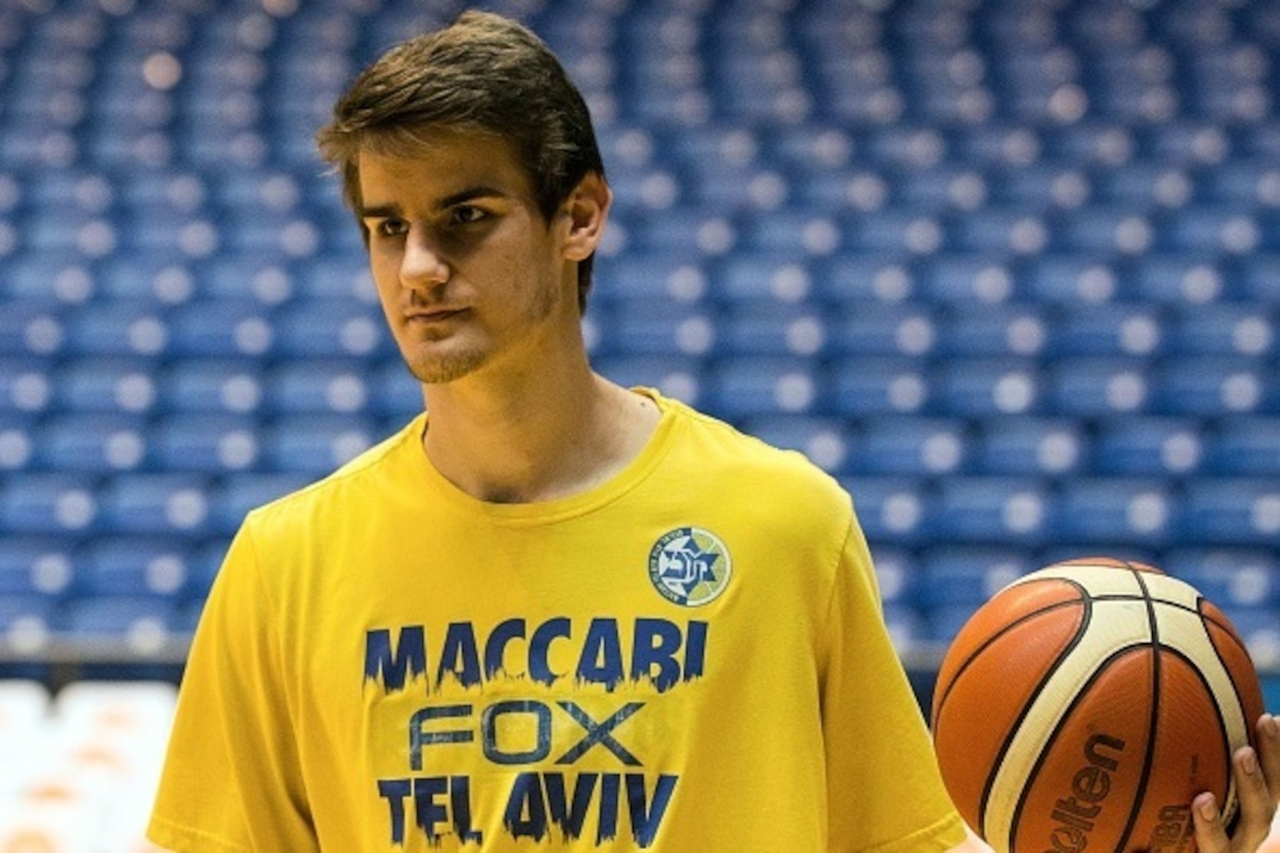 Dragan Bender, a professional Croatian basketball player currently playing for Maccabi Tel Aviv in the Israeli Basketball Super League attends a training session at the Menora Mivtachim Arena in Tel Aviv on March 16, 2016.
Bender's name is not yet well kn Dragan Bender, a professional Croatian basketball player currently playing for Maccabi Tel Aviv in the Israeli Basketball Super League attends a training session at the Menora Mivtachim Arena in Tel Aviv on March 16, 2016.
Bender's name is not yet well kn