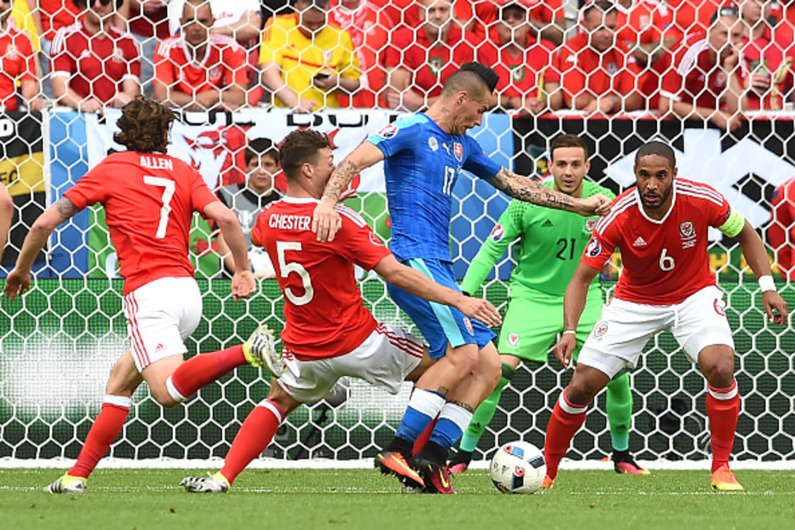 Slovakia's midfielder Marek Hamsik (C) vies for the ball with Wales' defender James Chester (2R) and Wales' defender Ashley Williams (R) during the Euro 2016 group B football match between Wales and Slovakia at the Stade de Bordeaux in Bordeaux on June 11 Slovakia's midfielder Marek Hamsik (C) vies for the ball with Wales' defender James Chester (2R) and Wales' defender Ashley Williams (R) during the Euro 2016 group B football match between Wales and Slovakia at the Stade de Bordeaux in Bordeaux on June 11