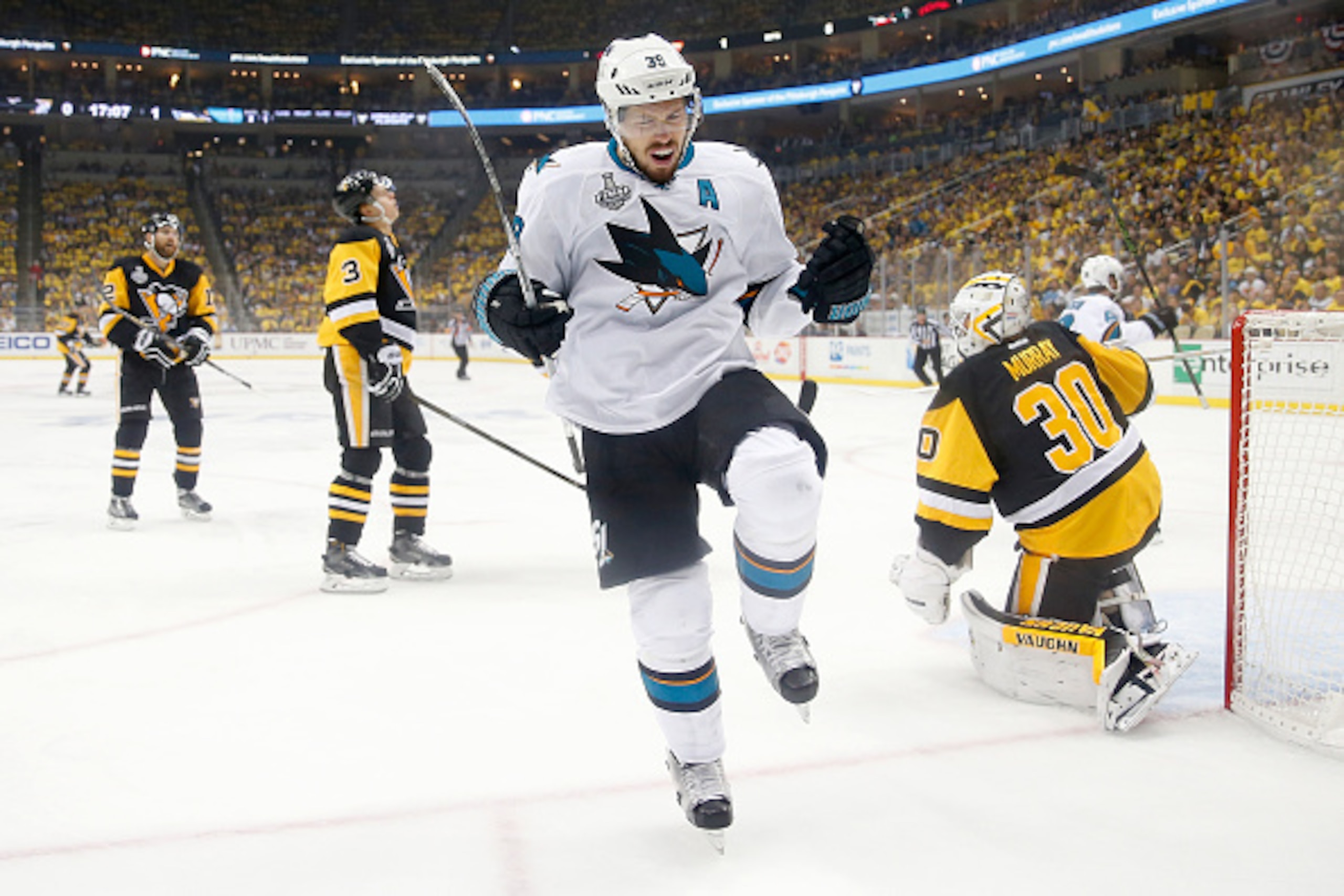 PITTSBURGH, PA - JUNE 09:  Logan Couture #39 of the San Jose Sharks celebrates after scoring a goal against Matt Murray #30 of the Pittsburgh Penguins during the first period in Game Five of the 2016 NHL Stanley Cup Final at Consol Energy Center on June 9
