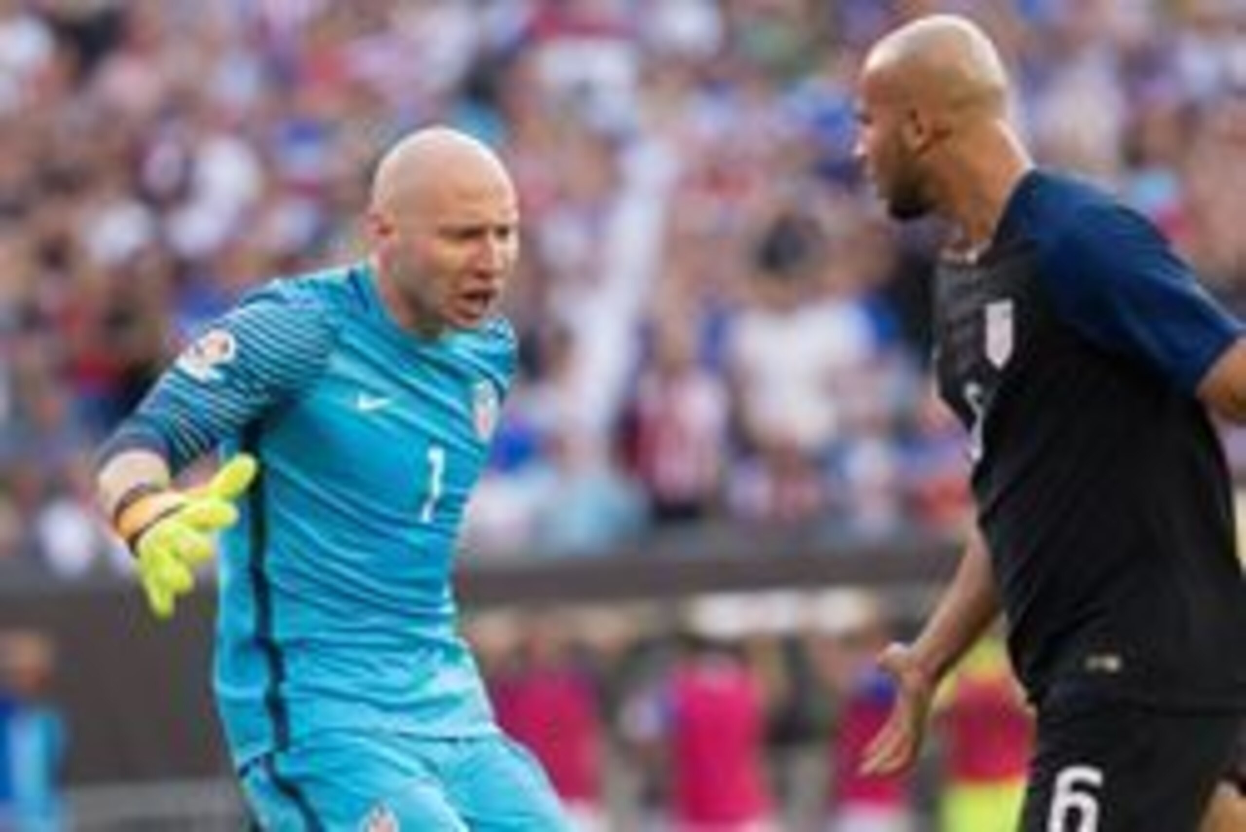 Jun 11, 2016; Philadelphia, PA, USA; United States goalkeeper Brad Guzan (1) reacts with defender John Brooks (6) after a defensive stop against Paraguay during the first half of the group play stage of the 2016 Copa America Centenario. at Lincoln Financi