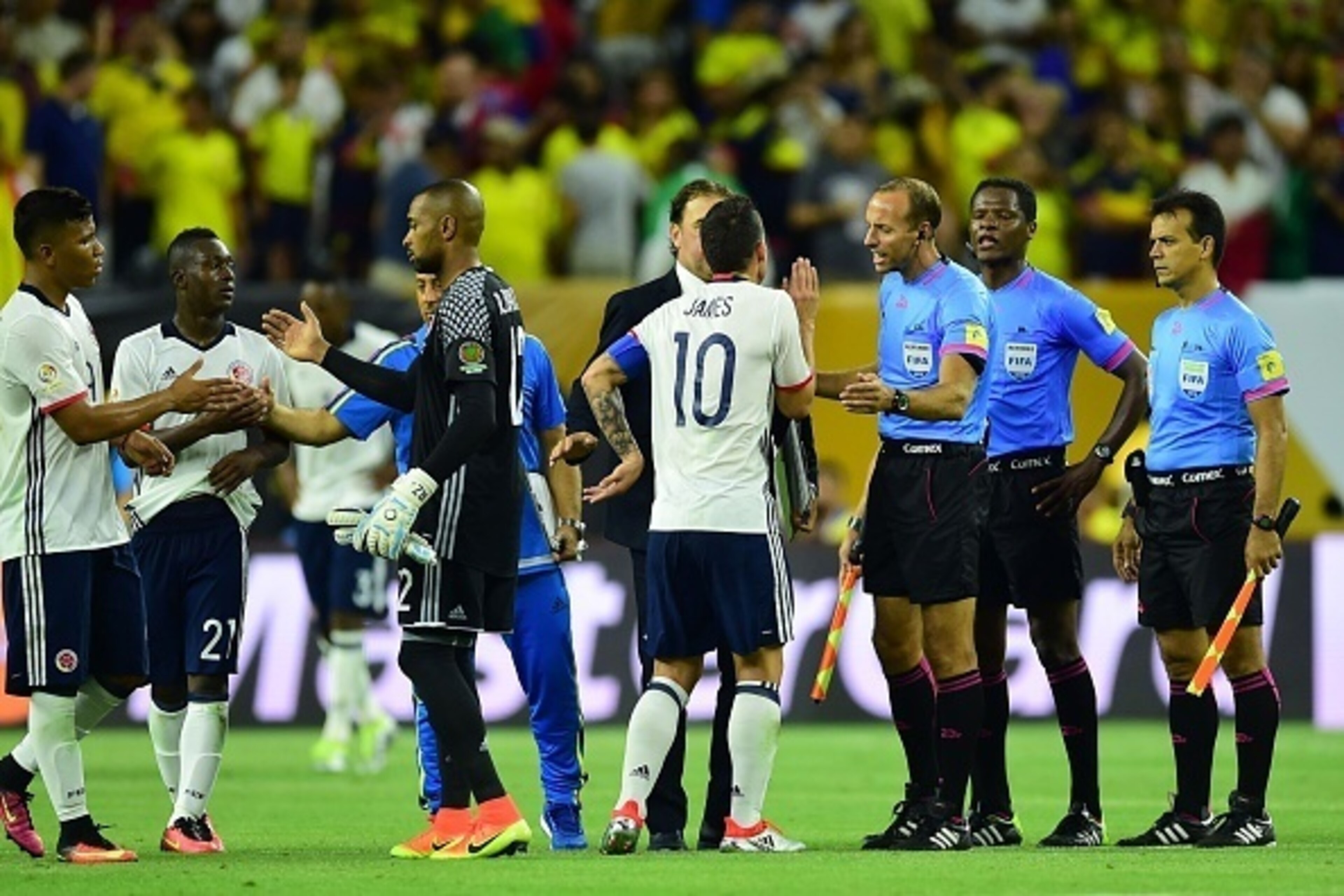 Colombia's James Rodriguez (10) argues with the referees after being defeated by Costa Rica in their Copa America Centenario football tournament match in Houston, Texas, United States, on June 11, 2016.  / AFP / ALFREDO ESTRELLA        (Photo credit shoul