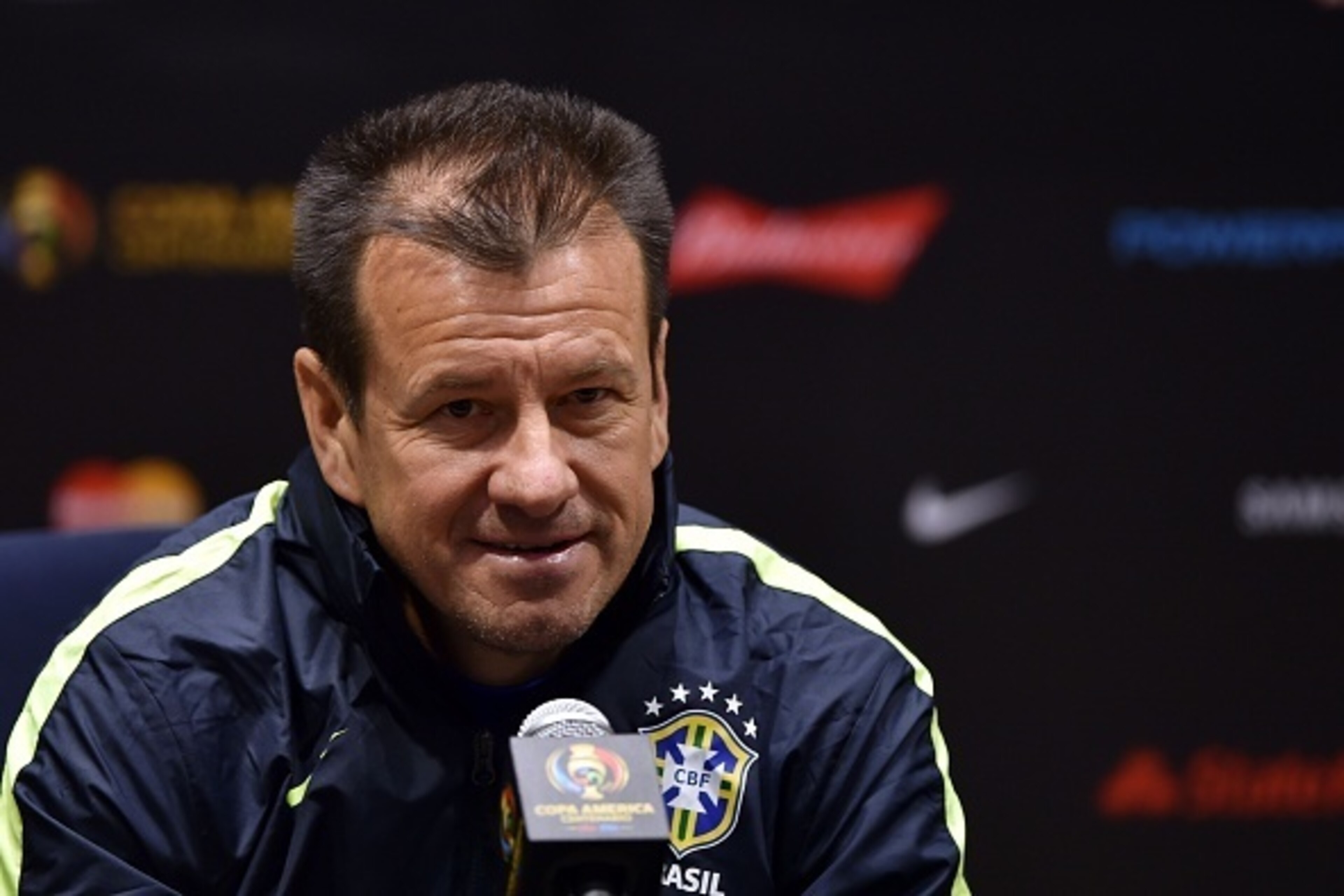Brazil coach Carlos Caetano Bledorn Verri, commonly known as Dunga, speaks during a press conference at Gillette Stadium in Foxborough, Massachusetts on June 11, 2016. / AFP / HECTOR RETAMAL        (Photo credit should read HECTOR RETAMAL/AFP/Getty Images