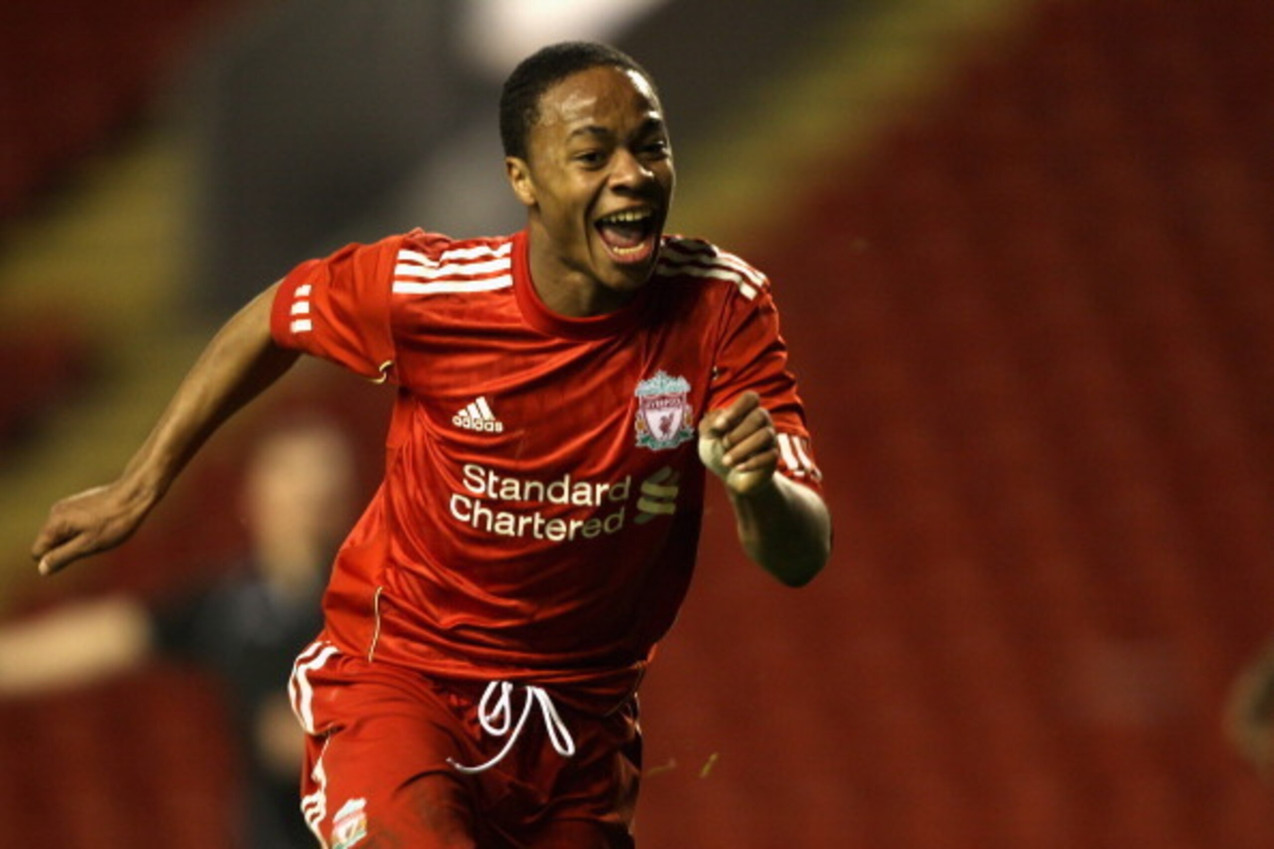 LIVERPOOL, ENGLAND - FEBRUARY 14:  Raheem Sterling of Liverpool celebrates after scoring his first goal during the FA Youth Cup match between Liverpool and Southend United at Anfield on February 14, 2011 in Liverpool, England.  (Photo by Clive Brunskill/G
