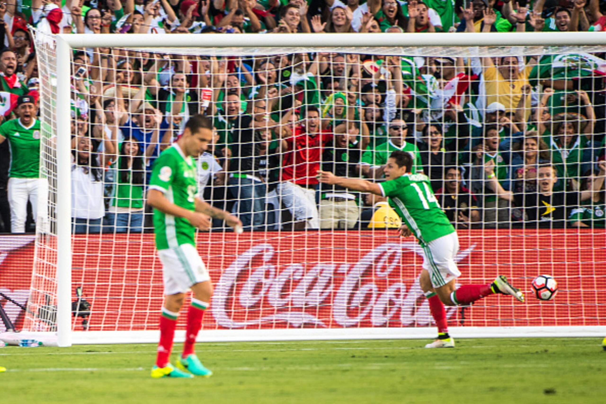 PASADENA, CA - JUNE 9:  Javier Hernandez #14 of Mexico scores a goal during the Copa America Centenario Group C match between Mexico and Jamaica at the Rose Bowl on June 9, 2016 in Pasadena, California.  Mexico won the match 2-0. (Photo by Shaun Clark/Get