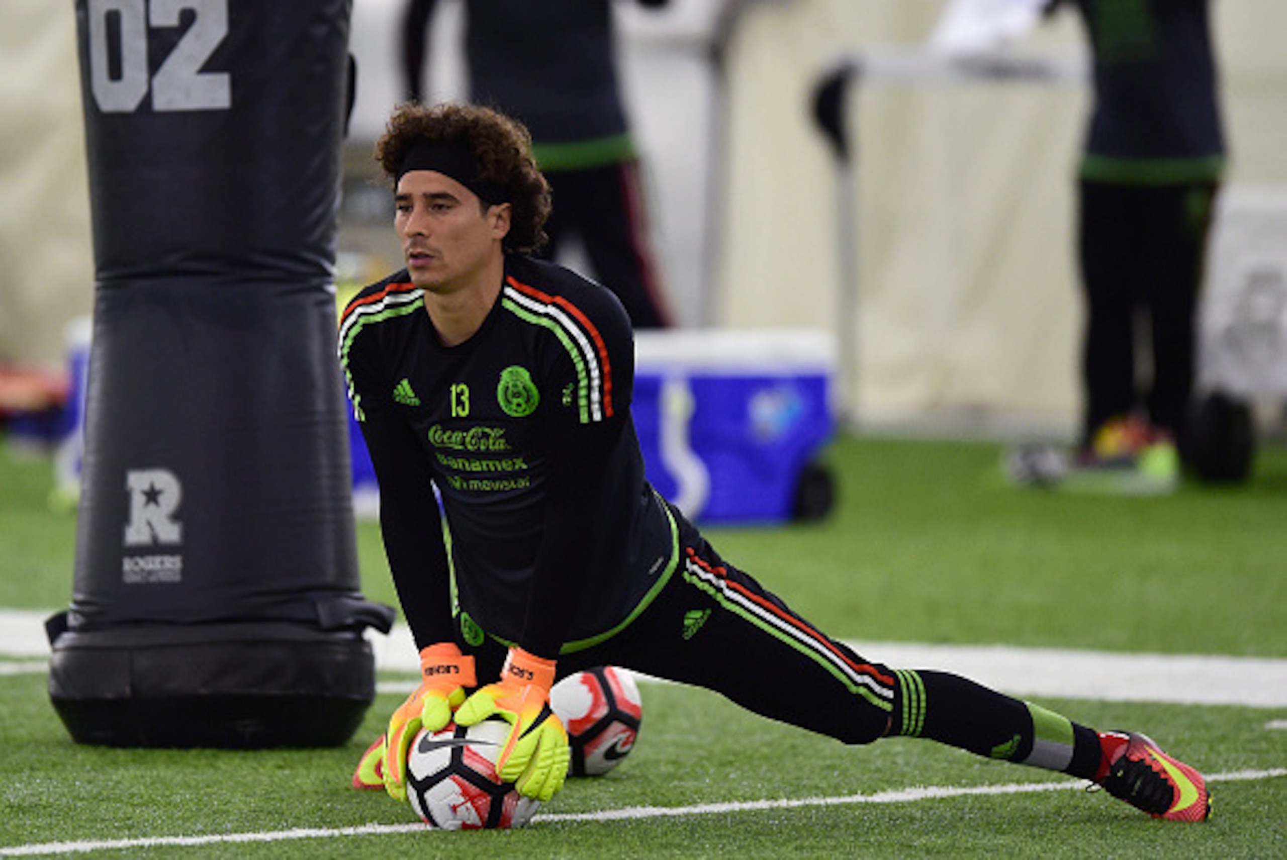 Guillermo Ochoa goalkeeper of Mexico warms up during a traning session at Methodist Training Center in Houston, Texas, on June 12, 2016. 
Mexico will face Venezuela on June 13 in their third match of the Copa America. / AFP / ALFREDO ESTRELLA        (Phot