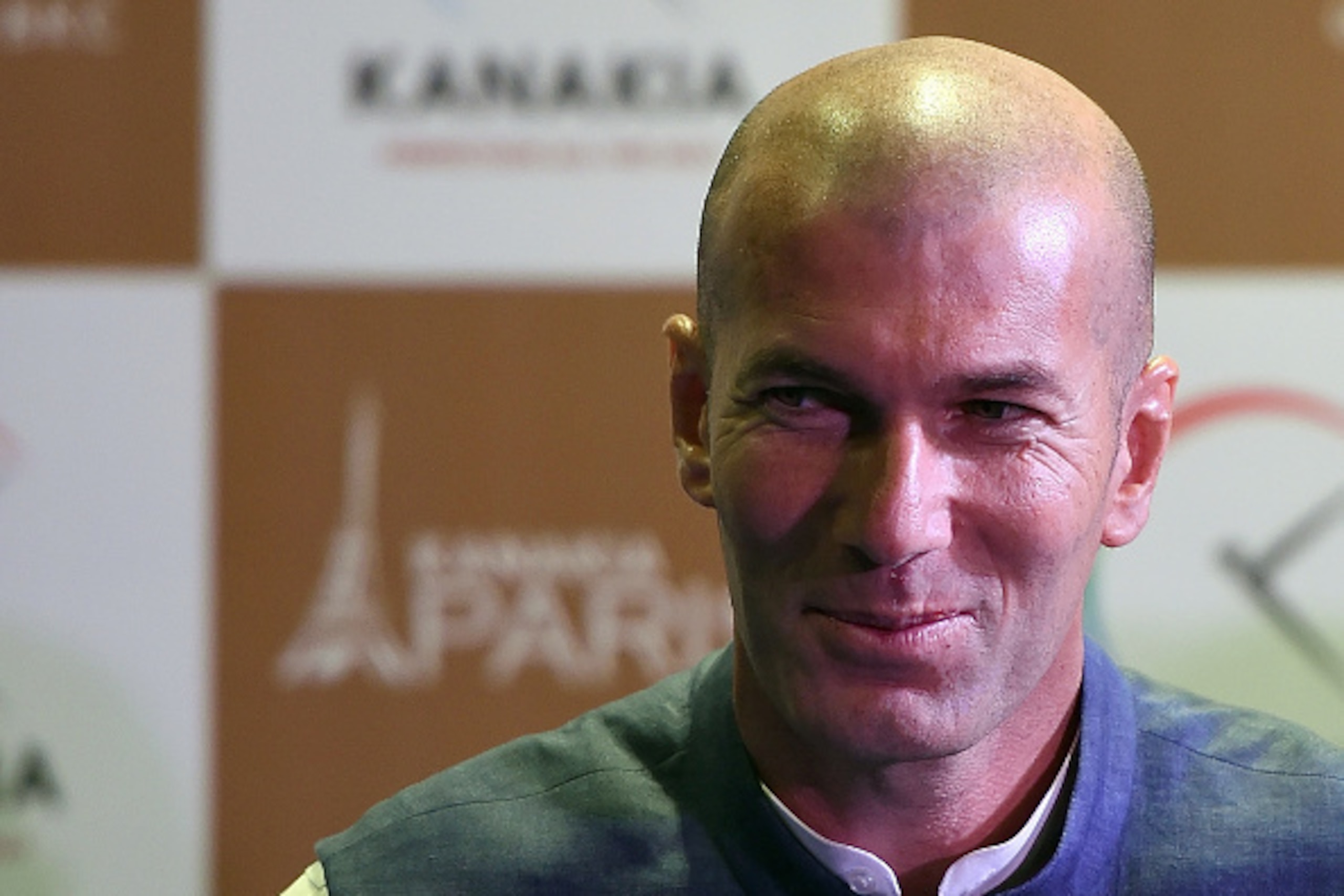 Real Madrid football coach and former French player Zinedine Zidane looks on during a press conference in Mumbai on June 10, 2016.
Zidane was announced as a brand ambassador for a new real-estate project. / AFP / PUNIT PARANJPE (Photo credit shoul Real Madrid football coach and former French player Zinedine Zidane looks on during a press conference in Mumbai on June 10, 2016.
Zidane was announced as a brand ambassador for a new real-estate project. / AFP / PUNIT PARANJPE (Photo credit shoul