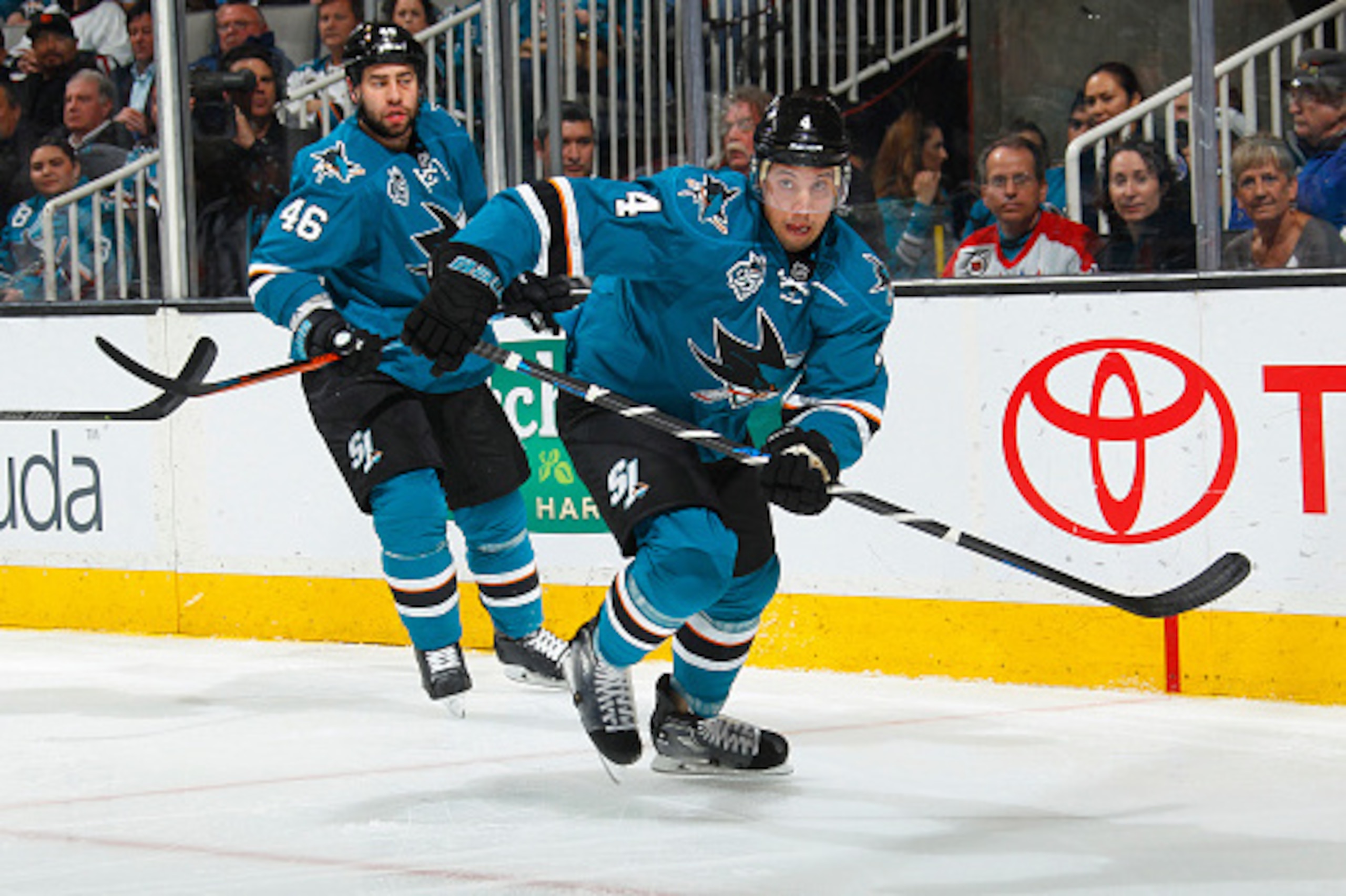 SAN JOSE, CA - MARCH 12:  Roman Polak #46 and Brenden Dillon #4 of the San Jose Sharks skate against the Washington Capitals  at SAP Center on March 12, 2016 in San Jose, California. (Photo by Rocky W. Widner/NHL/Getty Images)
