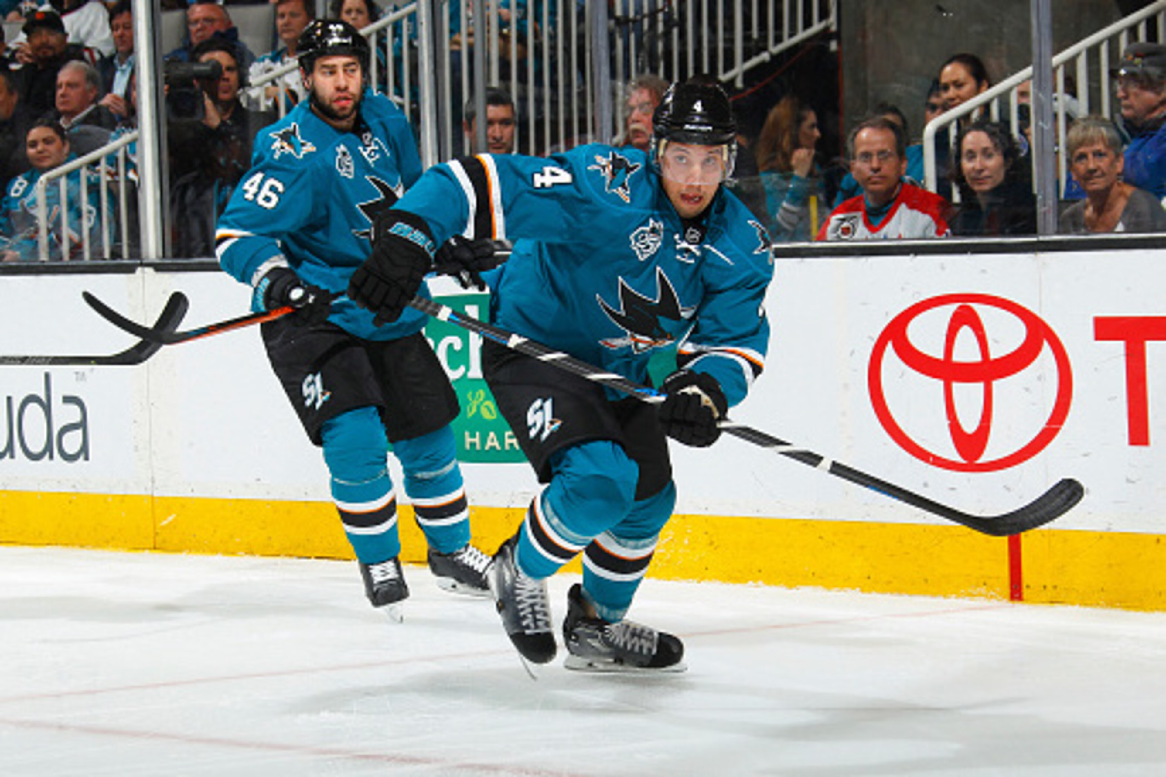 SAN JOSE, CA - MARCH 12:  Roman Polak #46 and Brenden Dillon #4 of the San Jose Sharks skate against the Washington Capitals  at SAP Center on March 12, 2016 in San Jose, California. (Photo by Rocky W. Widner/NHL/Getty Images)