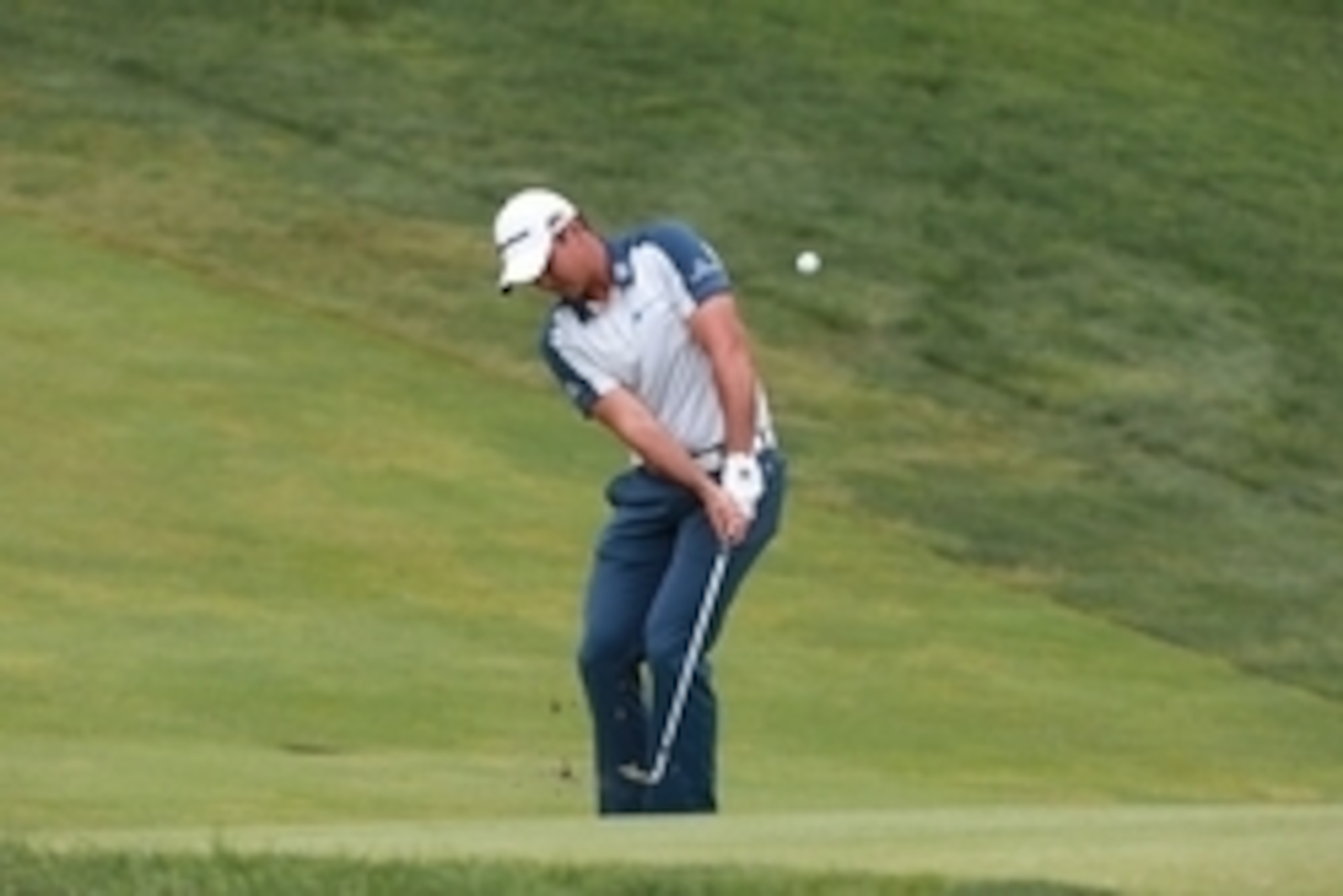 Jun 4, 2016; Dublin, OH, USA; Jason Day chips on the 18th hole during the third round of The Memorial Tournament at Muirfield Village Golf Club. Mandatory Credit: Brian Spurlock-USA TODAY Sports