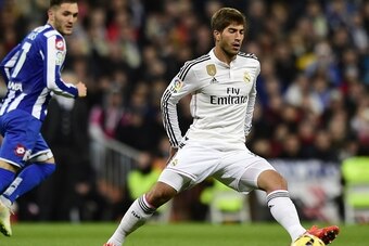 Real Madrid's Brazilian midfielder Lucas Silva tries to control the ball during the Spanish league football match Real Madrid CF vs RC Deportivo de la Coruna at the Santiago Bernabeu stadium in Madrid on February 14, 2015.   AFP PHOTO/ JAVIER SORIANO     