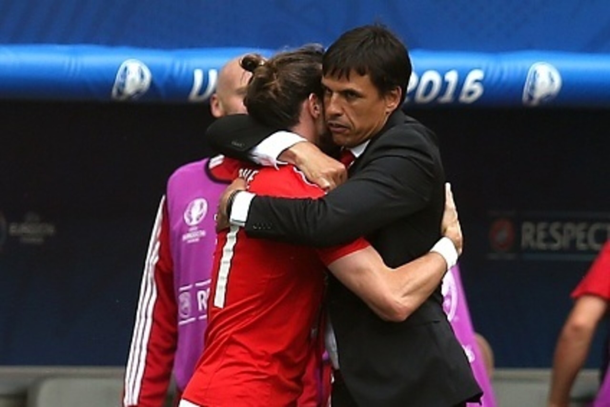 BORDEAUX, FRANCE - JUNE 11: Gareth Bale of Wales celebrates scoring the opening goal with manager Chris Coleman during the UEFA Euro 2016 Group B match between Wales and Slovakia at Nouveau Stade de Bordeaux on June 11, 2016 in Bordeaux, France. (Photo by