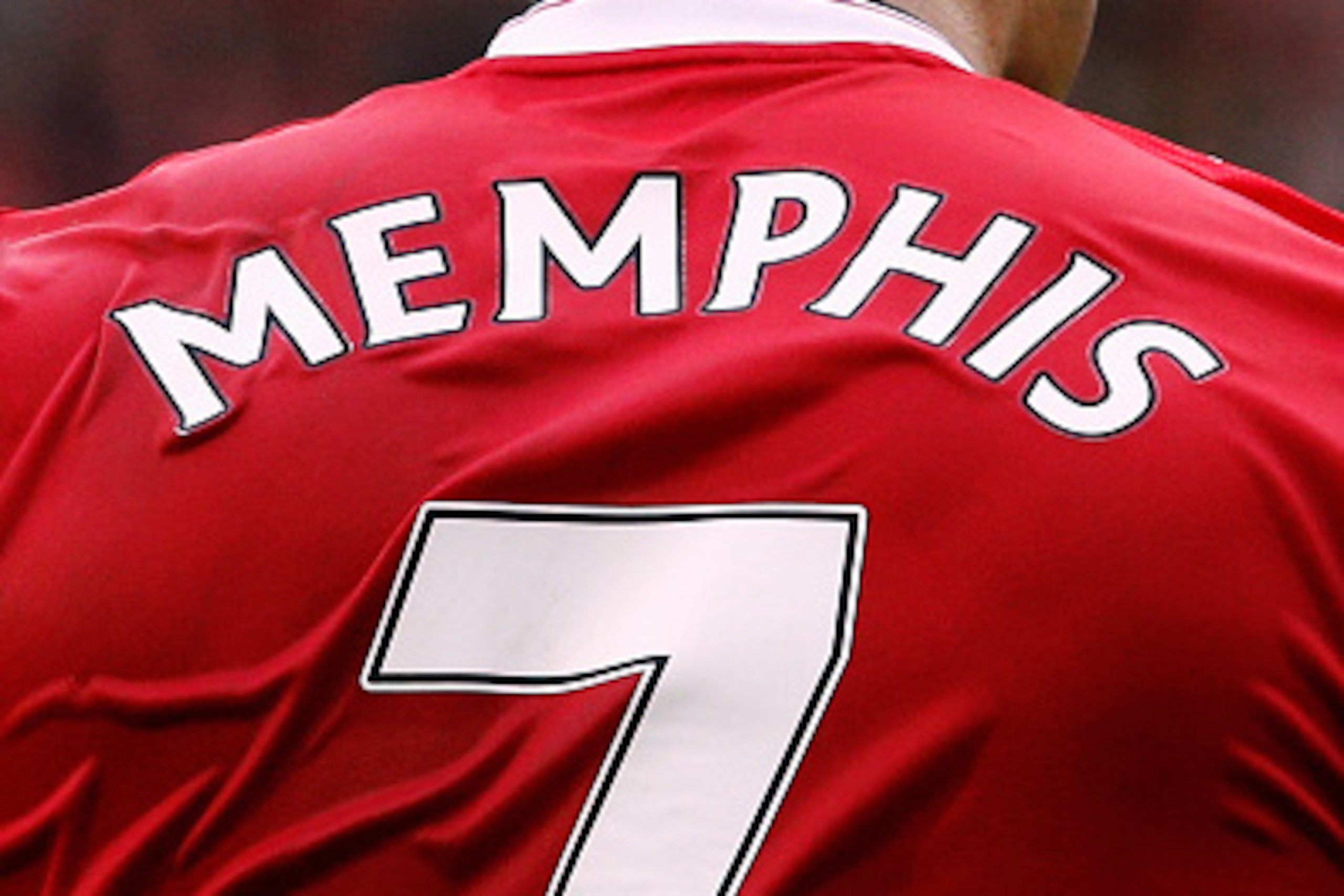 MANCHESTER, ENGLAND - SEPTEMBER 26:  A detailed look and the shirt and number 7 worn by Memphis Depay of Manchester United during the Barclays Premier League match between Manchester United and Sunderland at Old Trafford on September 26, 2015 in Mancheste