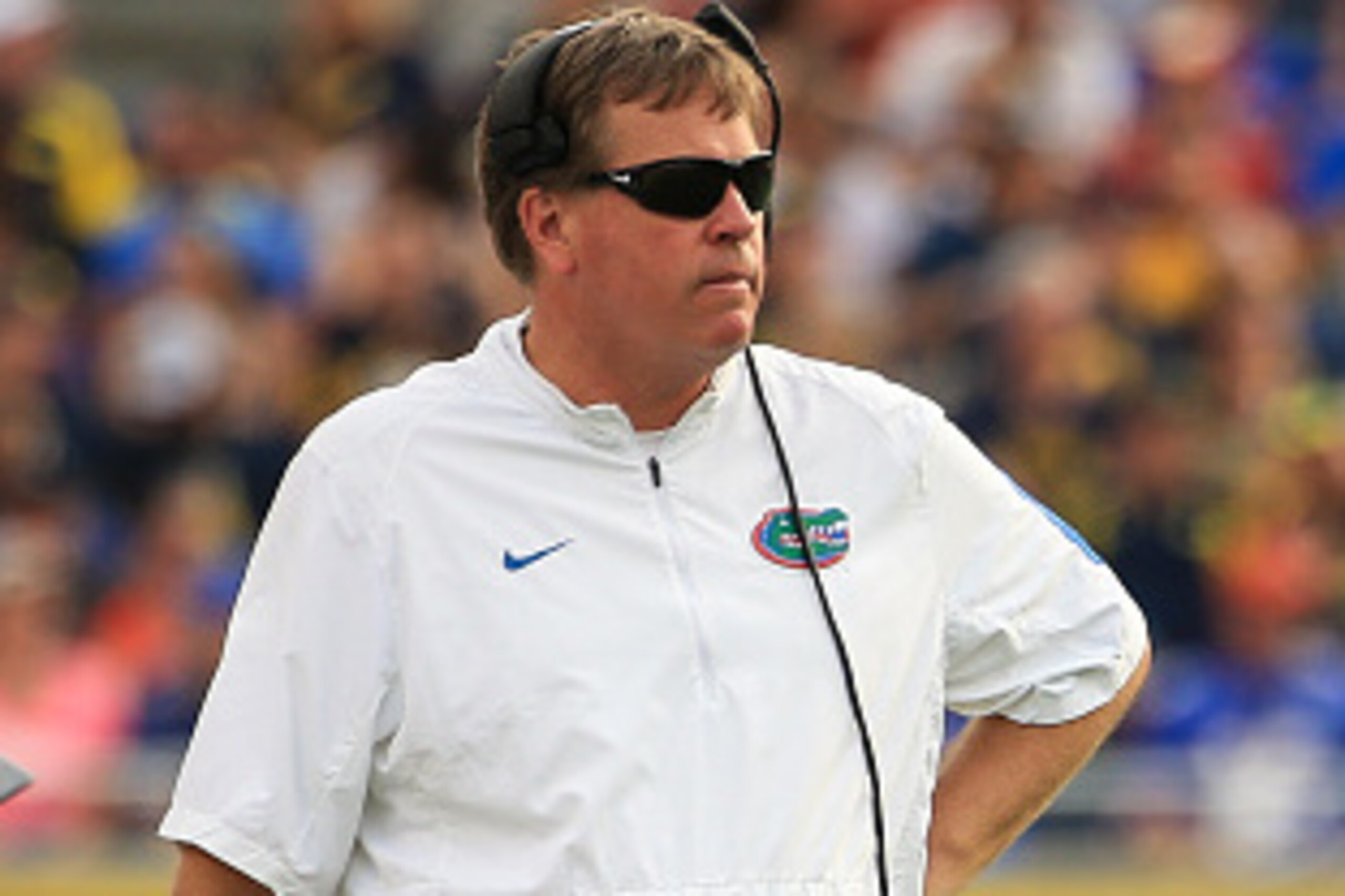 ORLANDO, FL - JANUARY 01: Head coach Jim McElwain of the Florida Gators looks on during the Buffalo Wild Wings Citrus Bowl game against the Michigan Wolverines at the Orlando Citrus Bowl on January 1, 2016 in Orlando, Florida.  (Photo by Rob Foldy/Getty I
